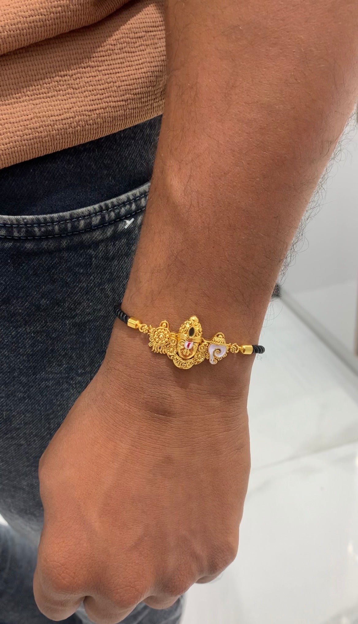 Beautiful Venkateswara swamy bracelet with adjustable black thread