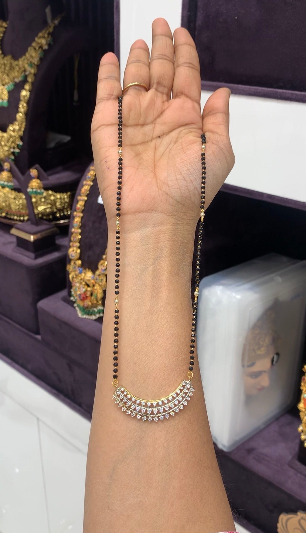 Beautiful white stone pendant with Blackbeads chain 18 inchs long
