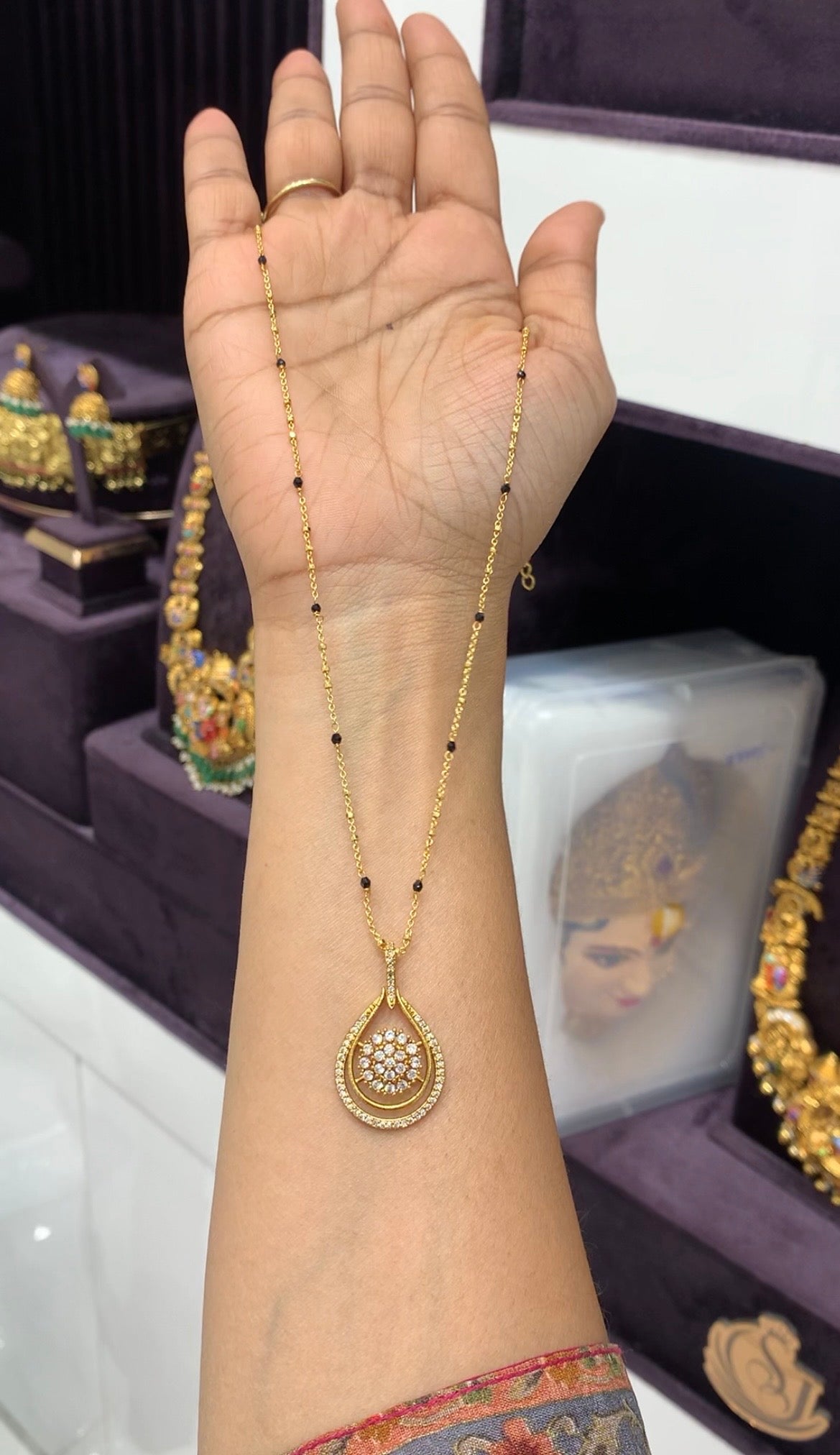 Beautiful white stones locket with Blackbeads & chandraharam chain 18 inchs long