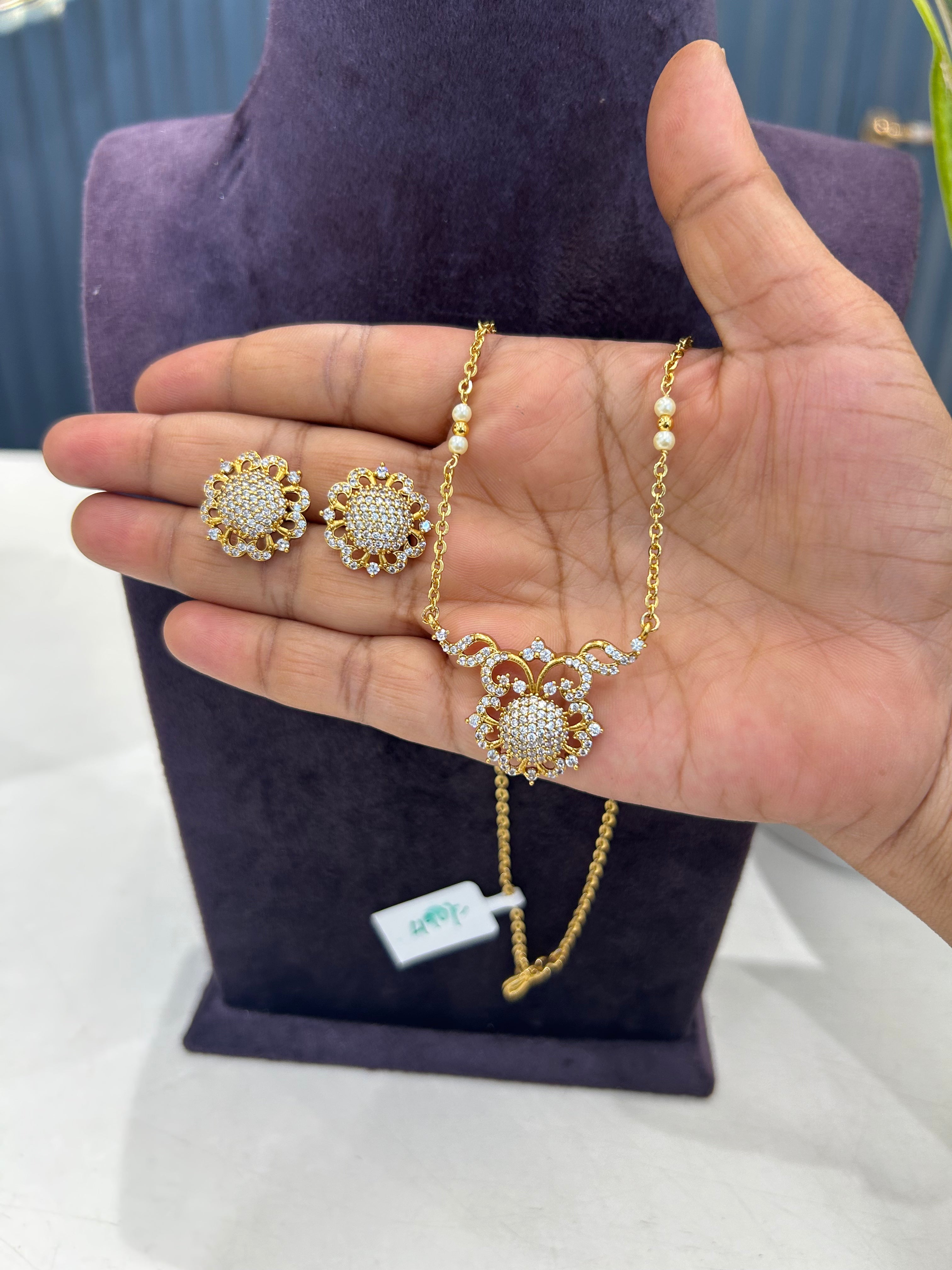 Beautiful white stone pendant set with handmaking pearls & Chandraharam chain 18 inchs long