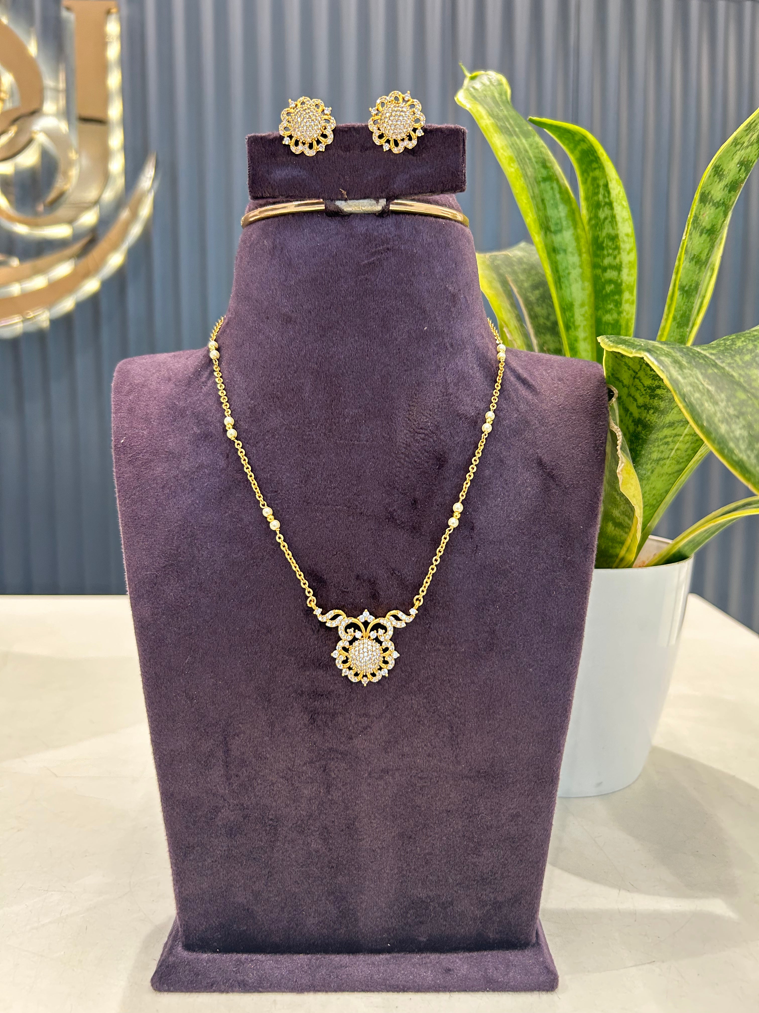 Beautiful white stone pendant set with handmaking pearls & Chandraharam chain 18 inchs long