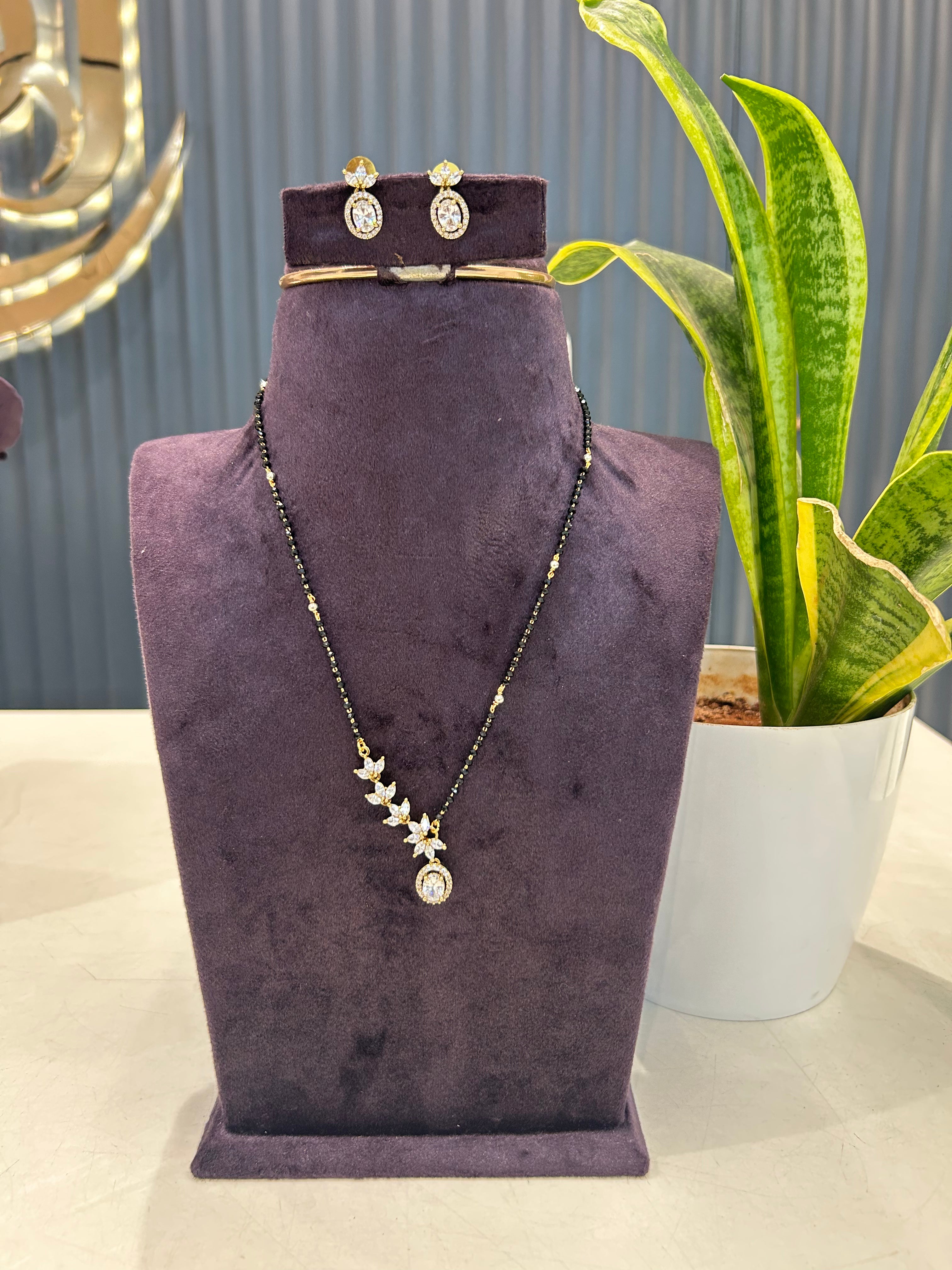 Beautiful Diamond Replica pendant set with blackbeads chain 18 inchs long