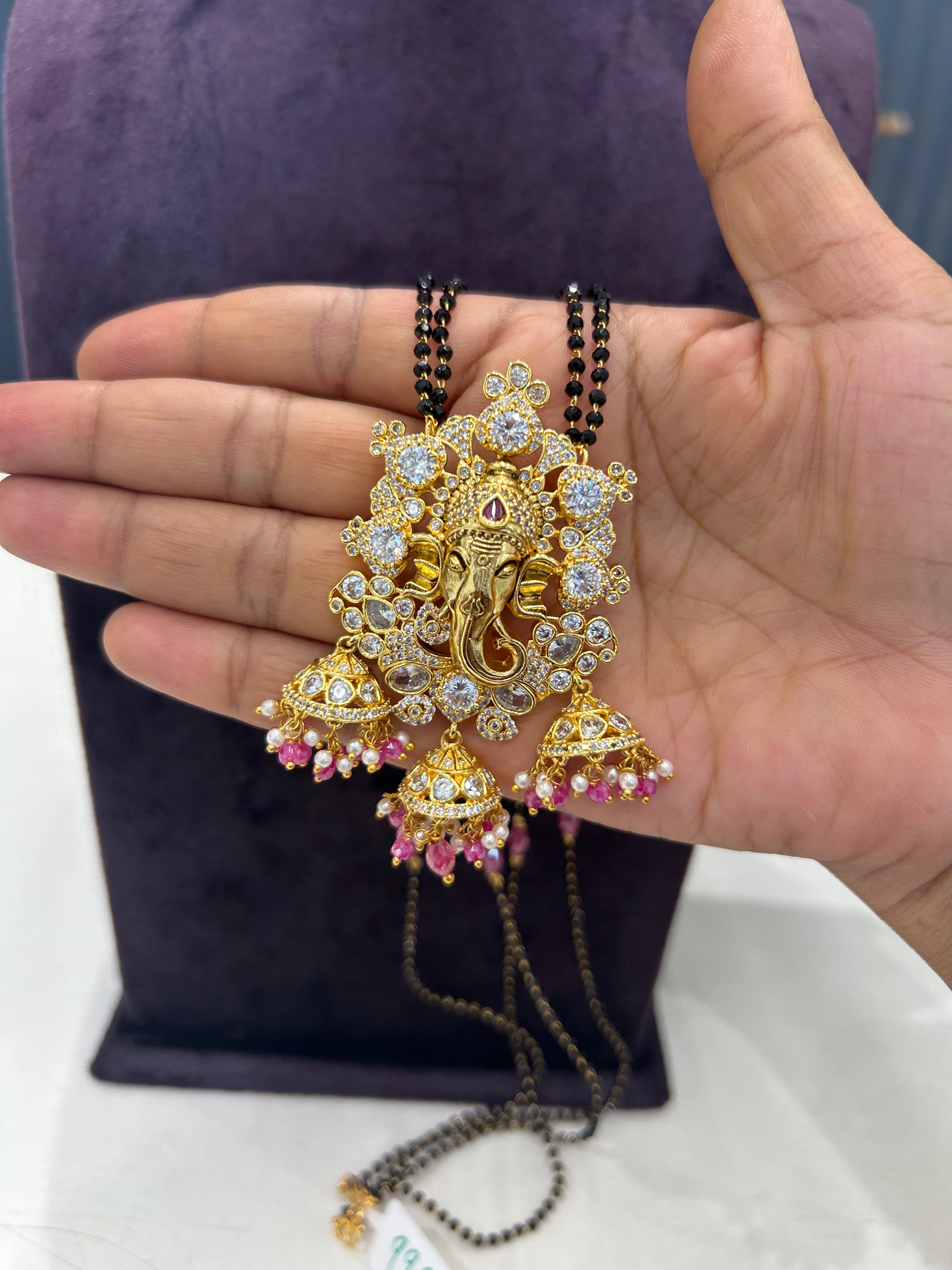 Beautiful uncut stone Ganesh pendant with blackbeads chain 24 inch long