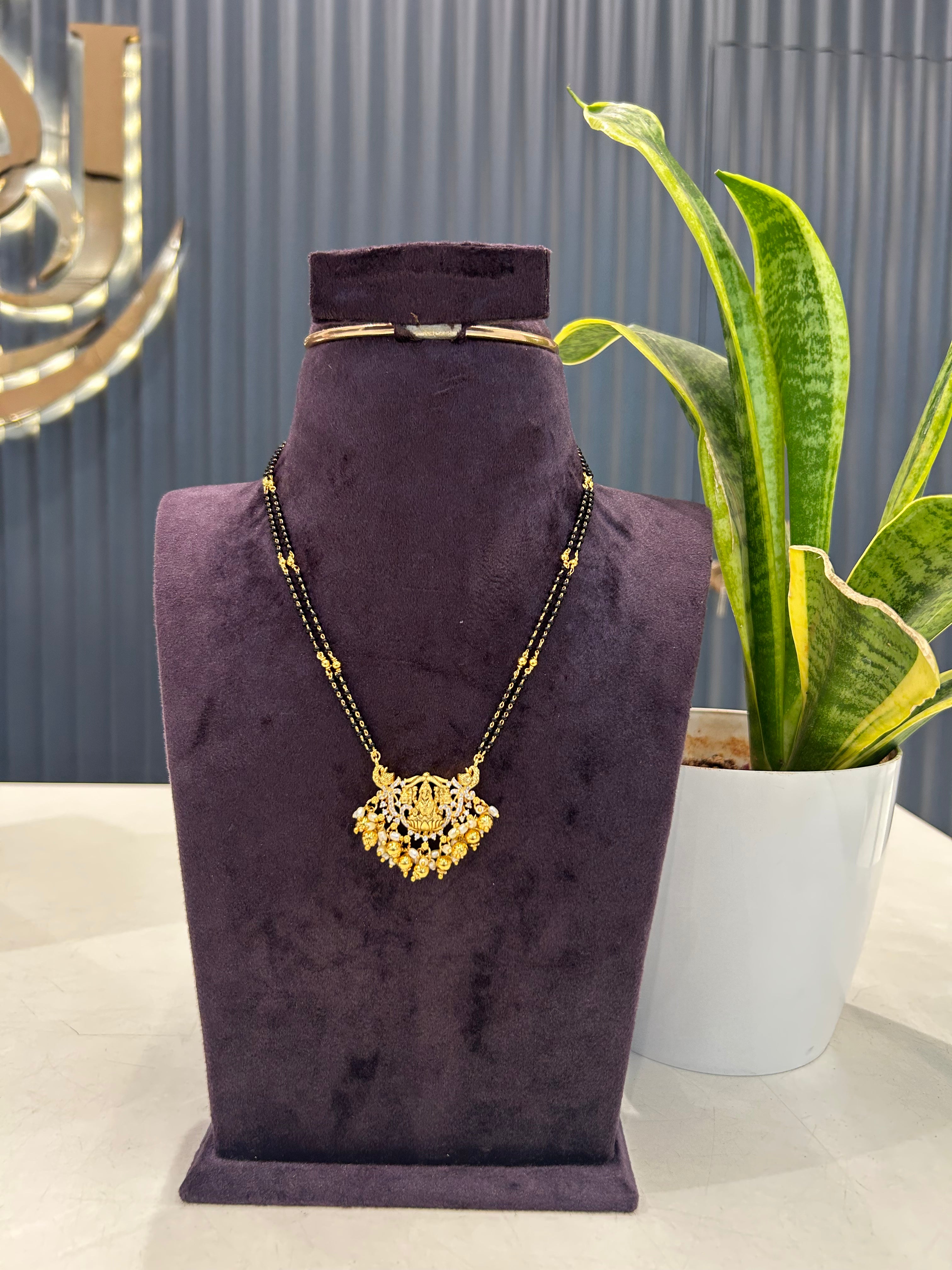 Beautiful Lakshmi devi pendant with Blackbeads chain 18 inchs long
