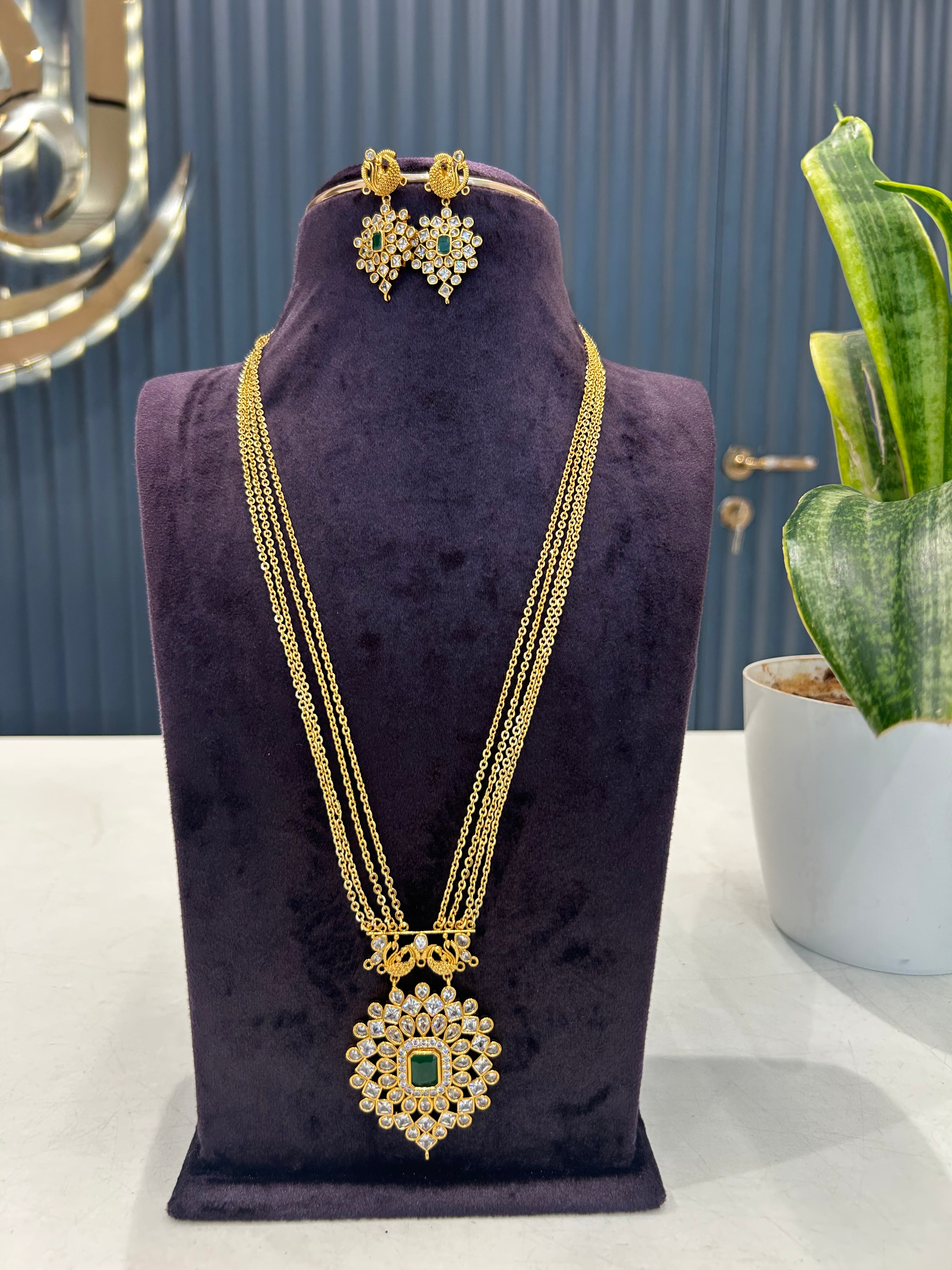Beautiful uncut stone pendant set with Chandraharam chain 24 inch long