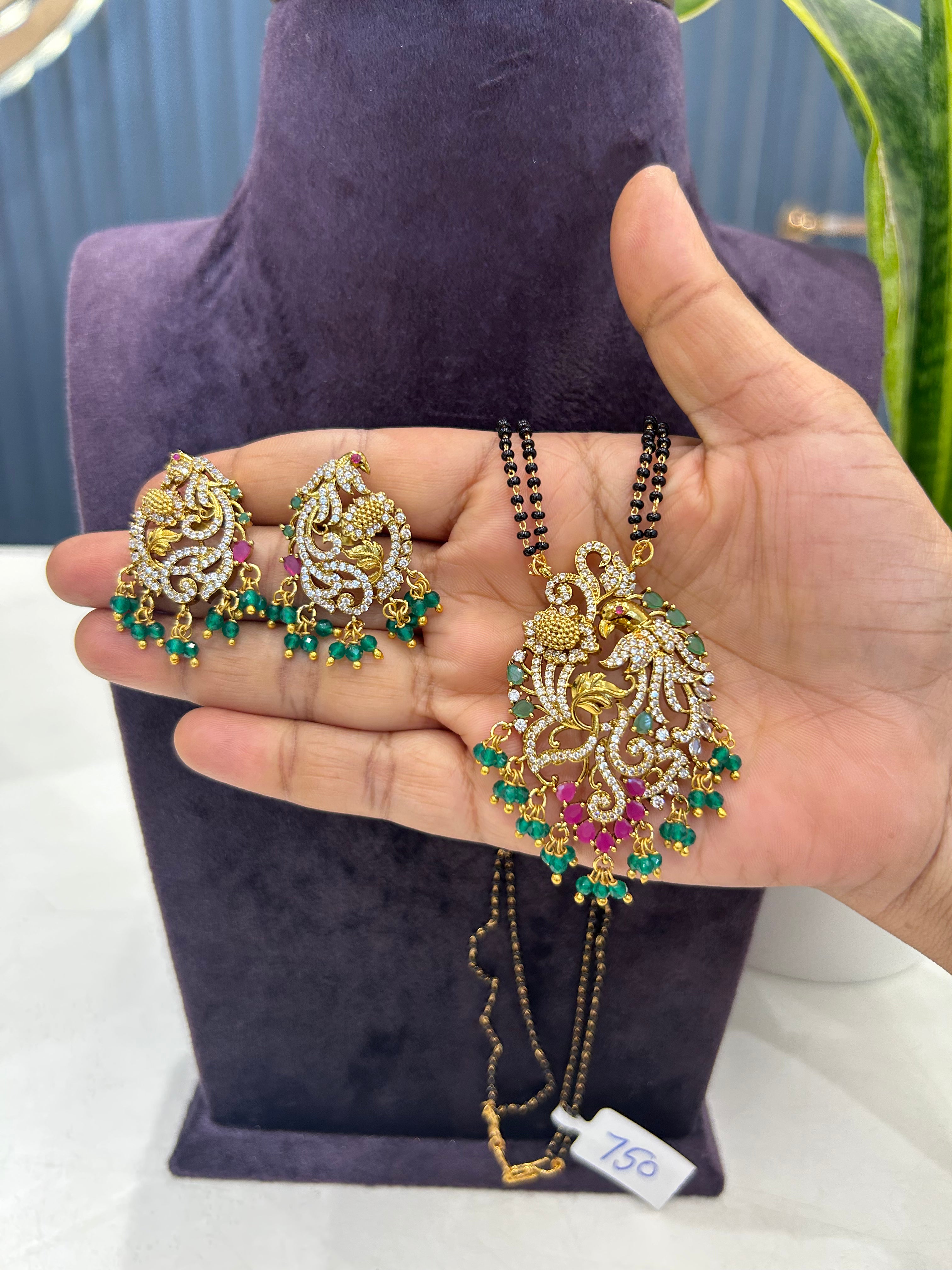 Beautiful peacock design pendant set with Blackbeads chain 18 inchs long