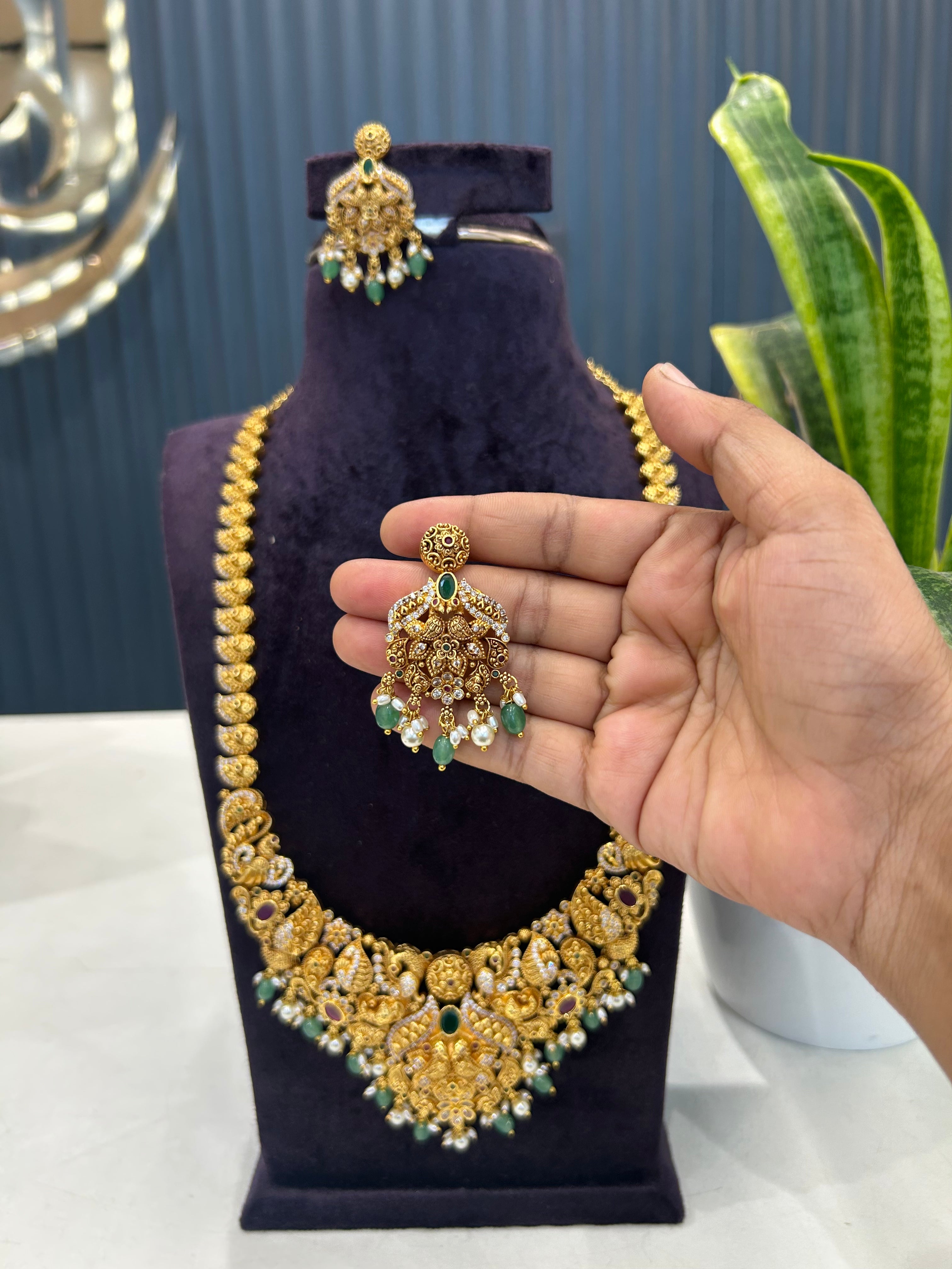Beautiful CZ stone peacock design embossing haram with ear hangings