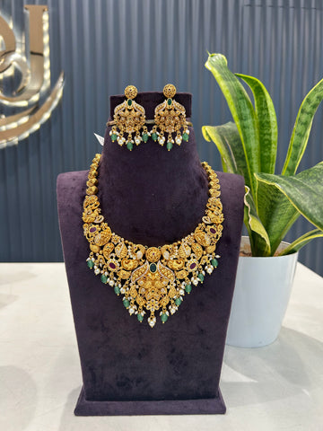 Beautiful peacock design embossing necklace with screwback ear hangings