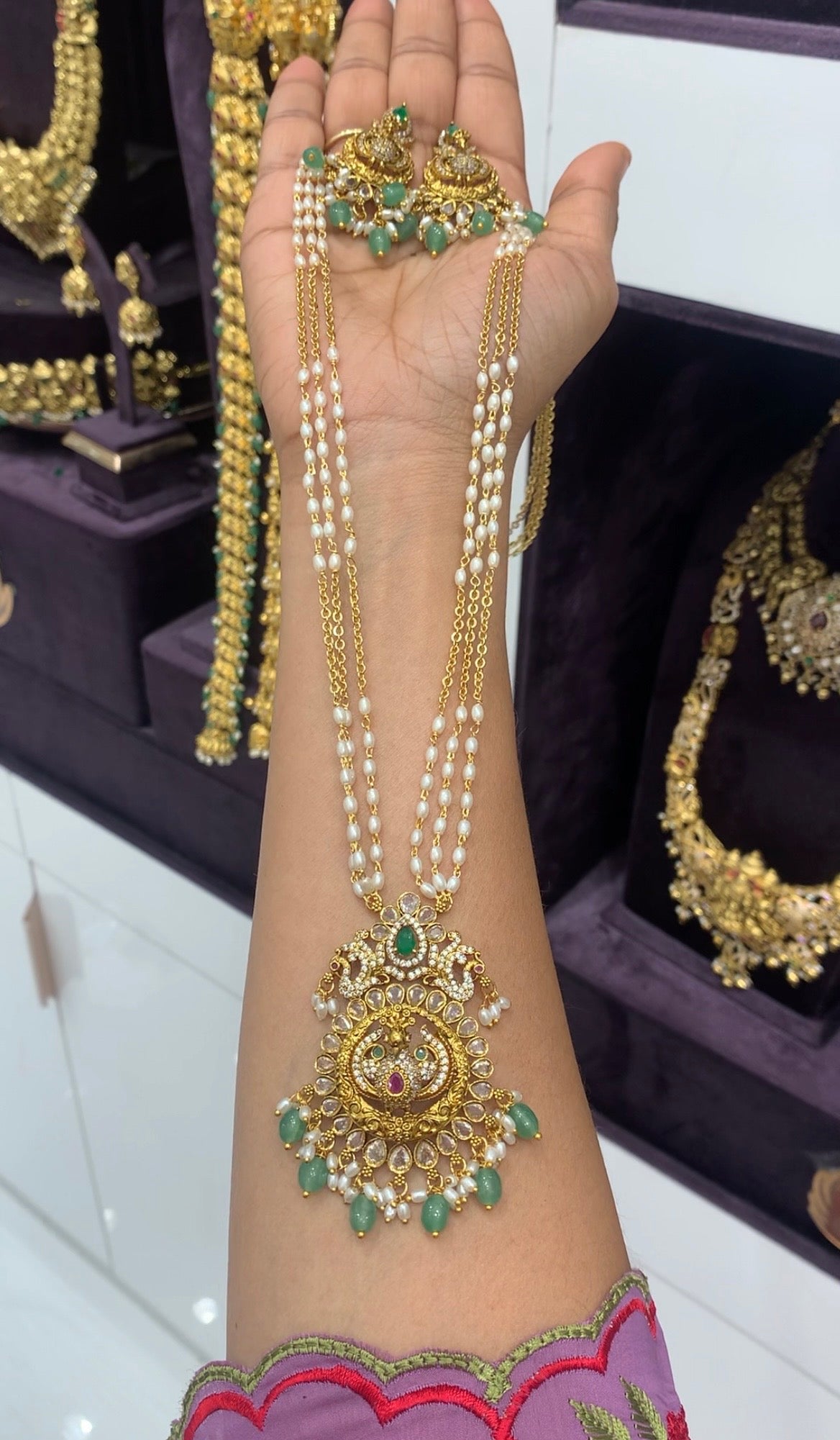 Beautiful uncut stone peacock design embossing pendant set with handmaking white pearls & Chandraharam chain 24 inch long