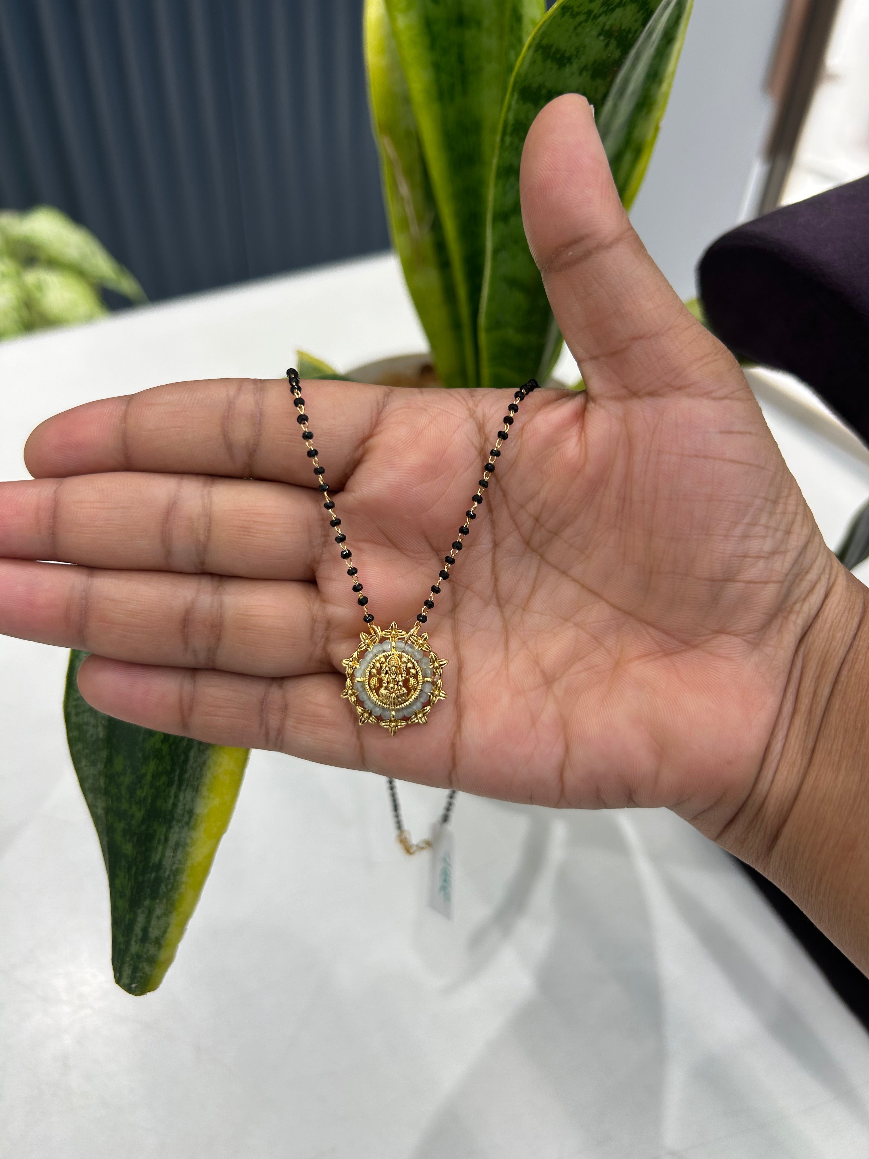Beautiful Lakshmi devi locket blackbeads chain 18 inchs long