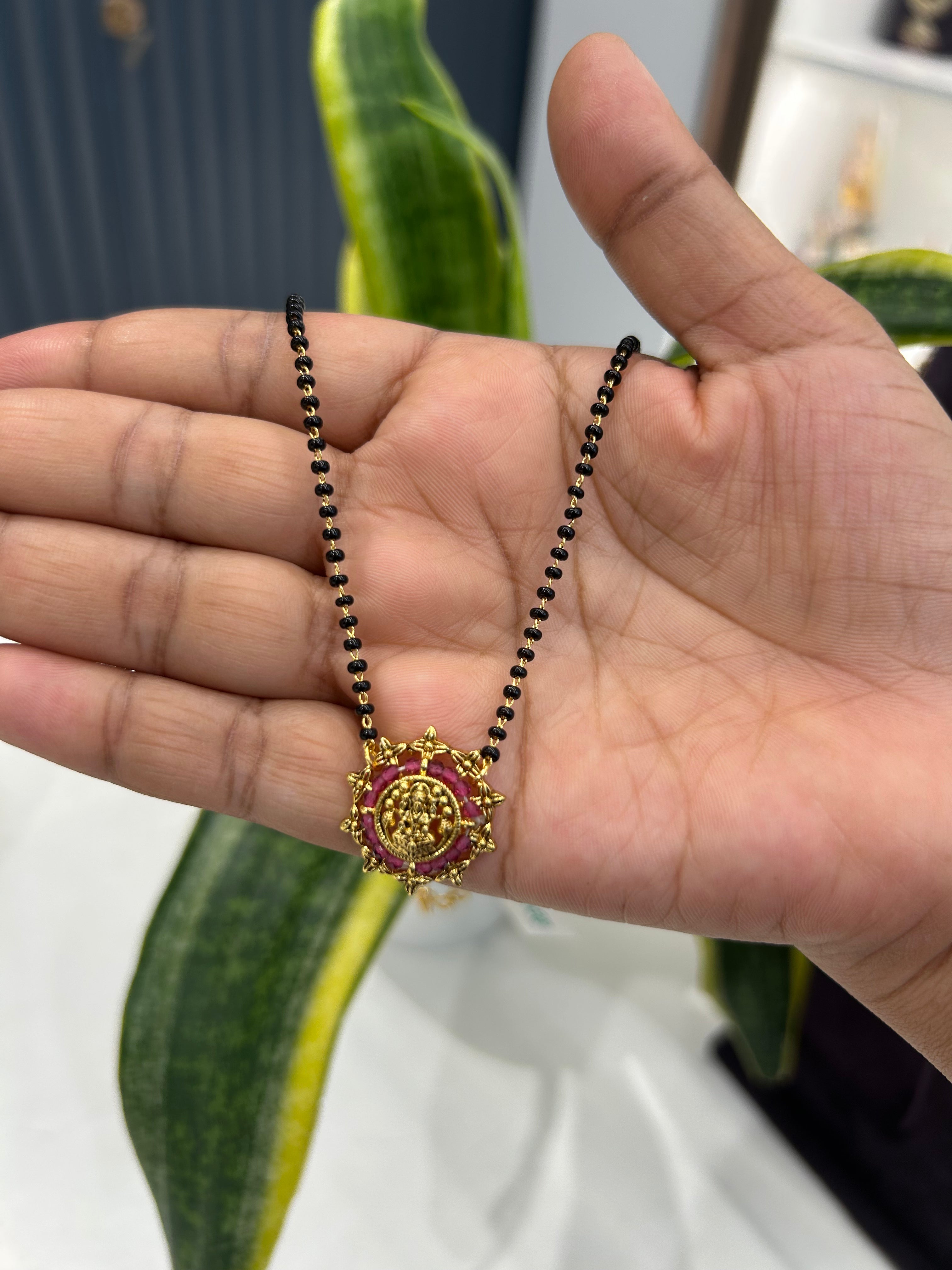 Beautiful simple lakshmi devi pendant with blackbeads chain 18 inchs long
