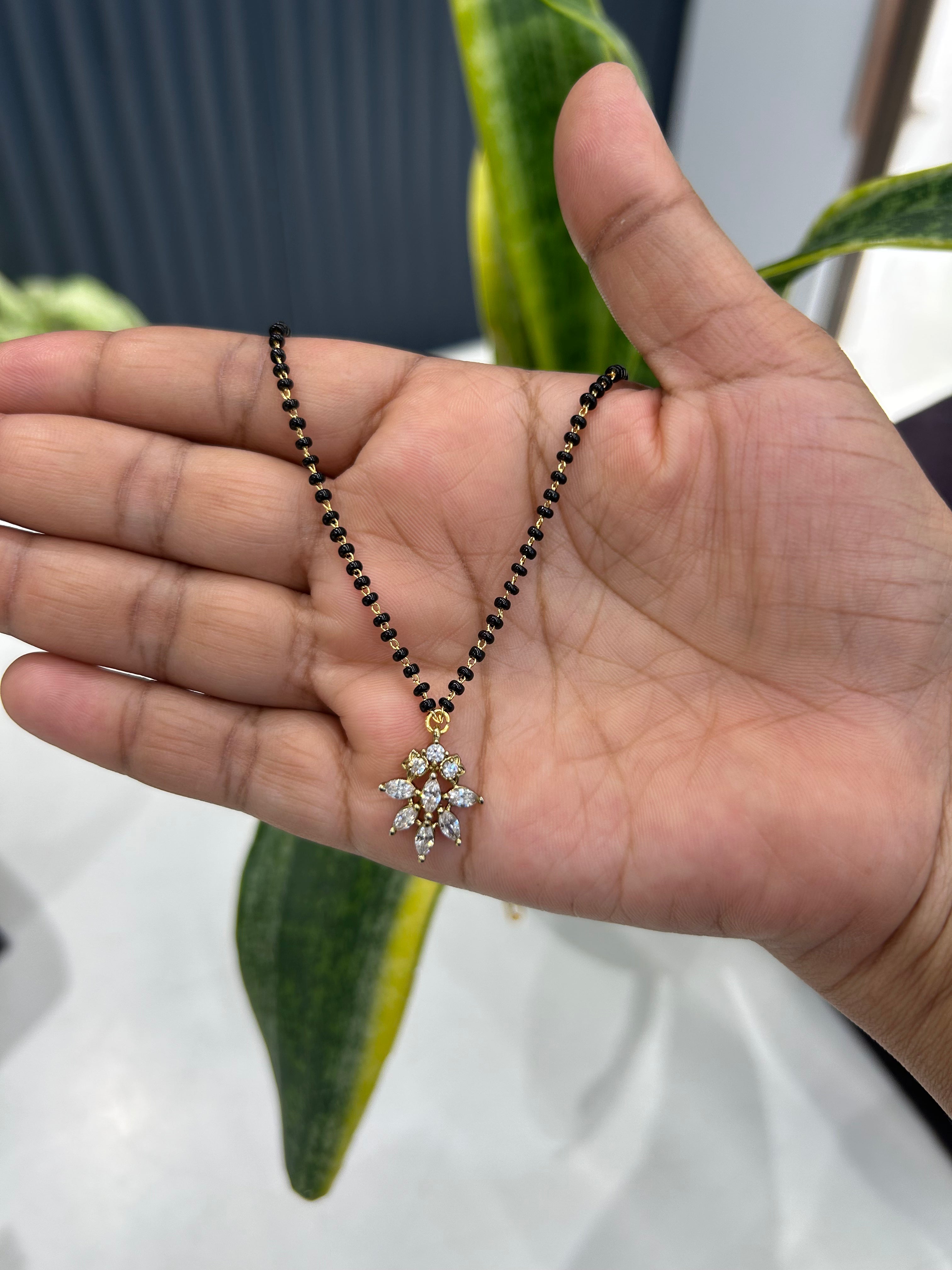Beautiful simple locket with blackbeads chain 18 inchs long