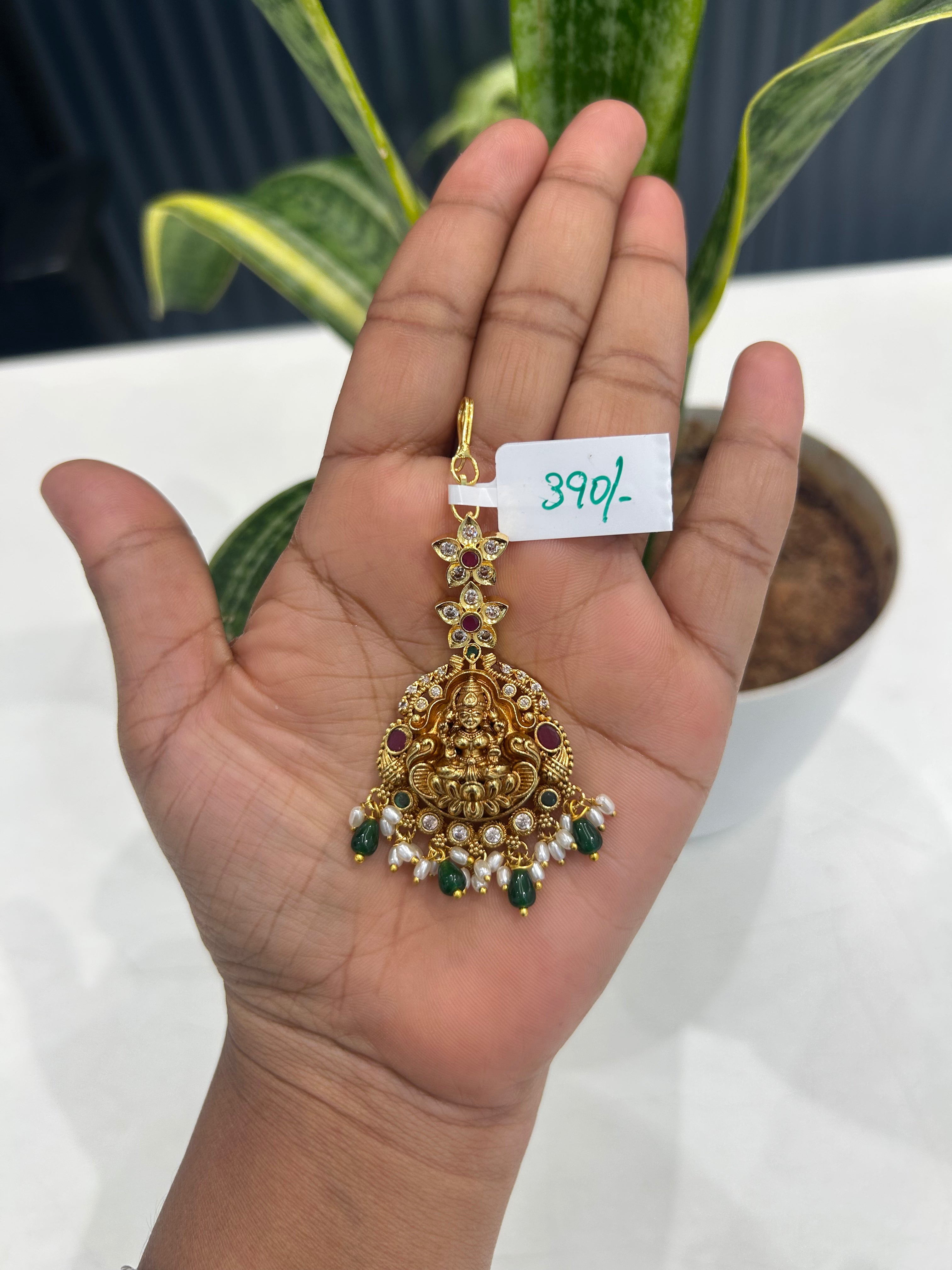Beautiful Lakshmi devi tikka with rice pearls