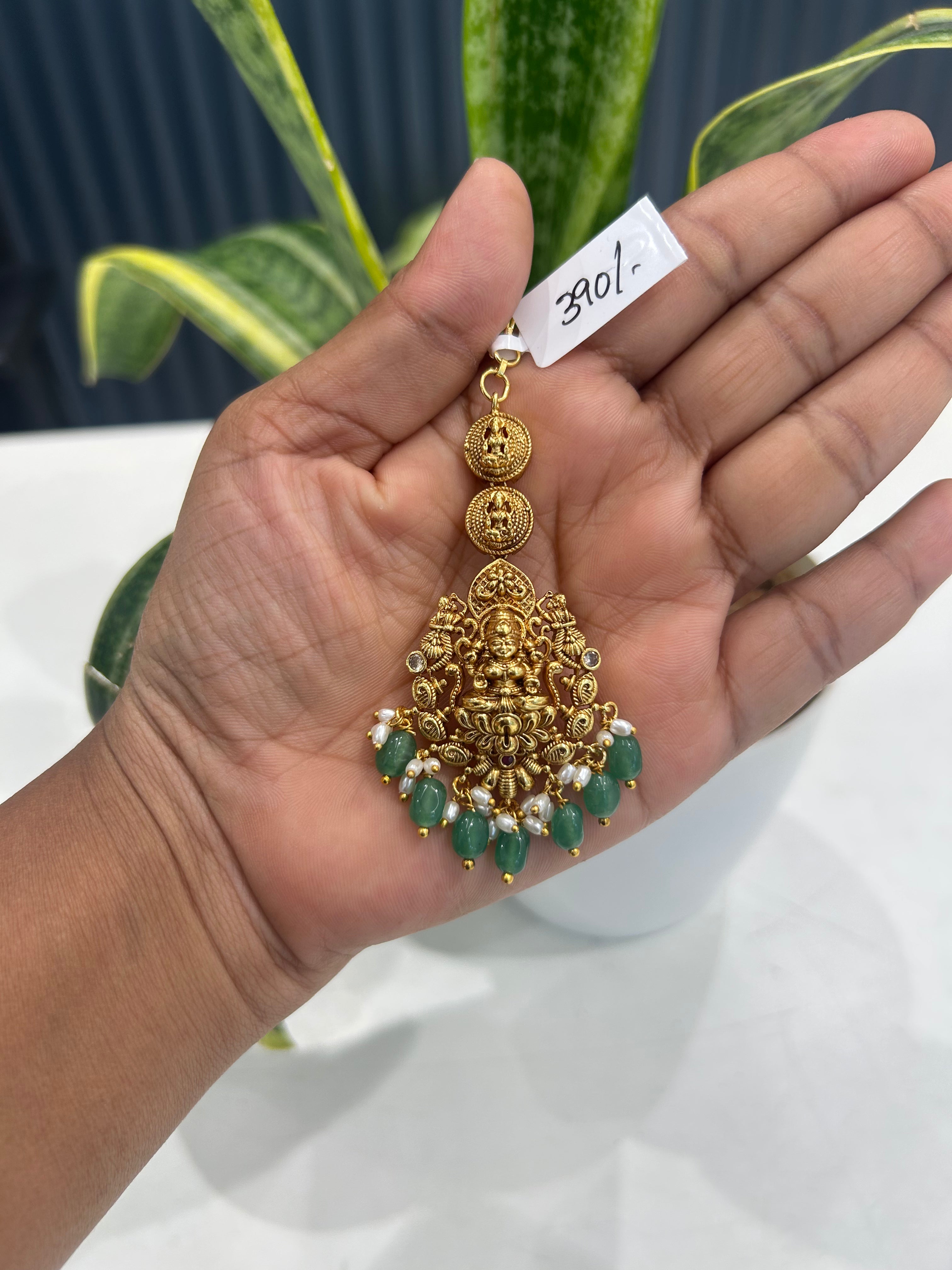 Beautiful Lakshmi devi tikka with green beads