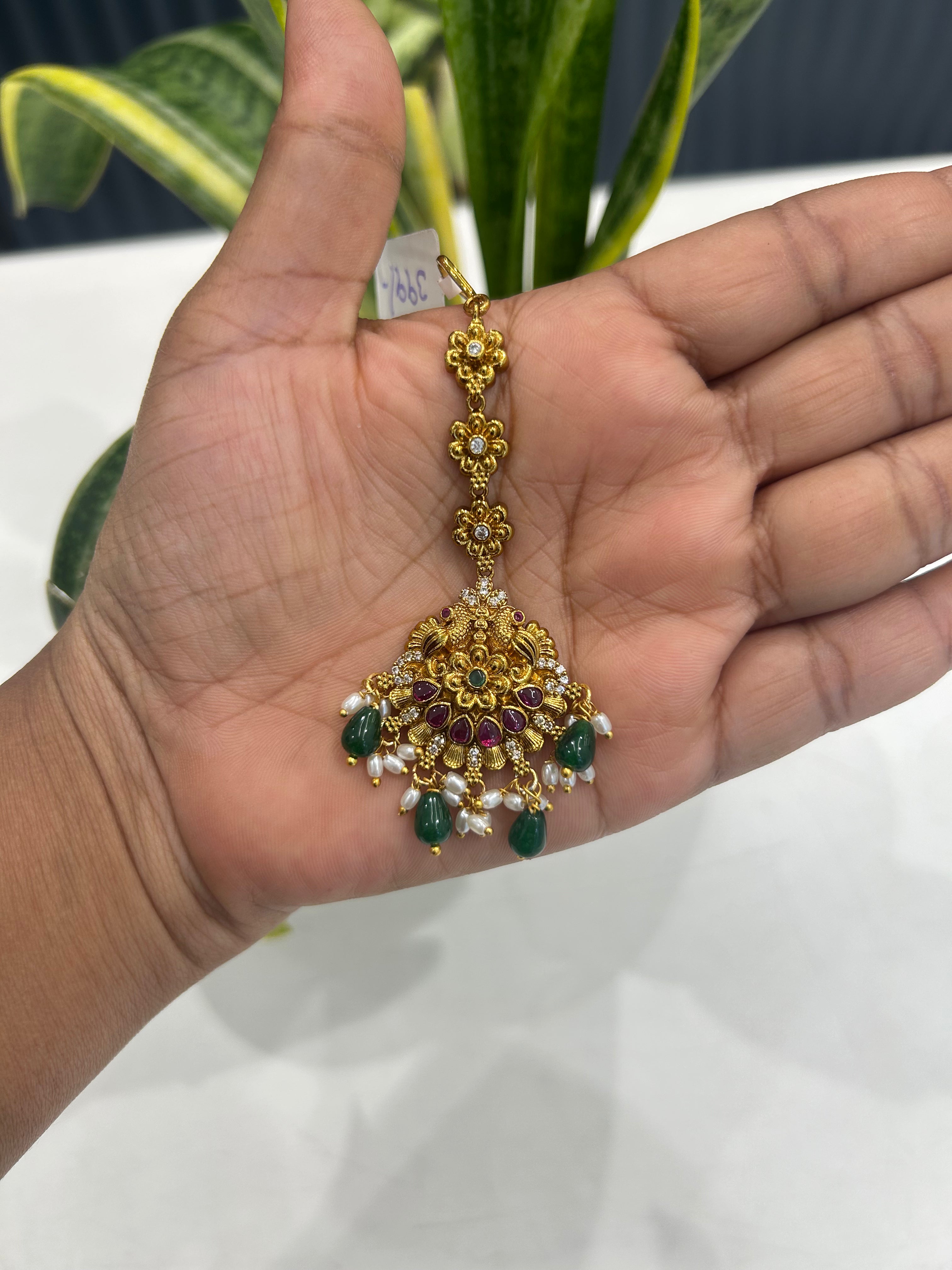 Beautiful pota stone,peacocok design tikka with green beads