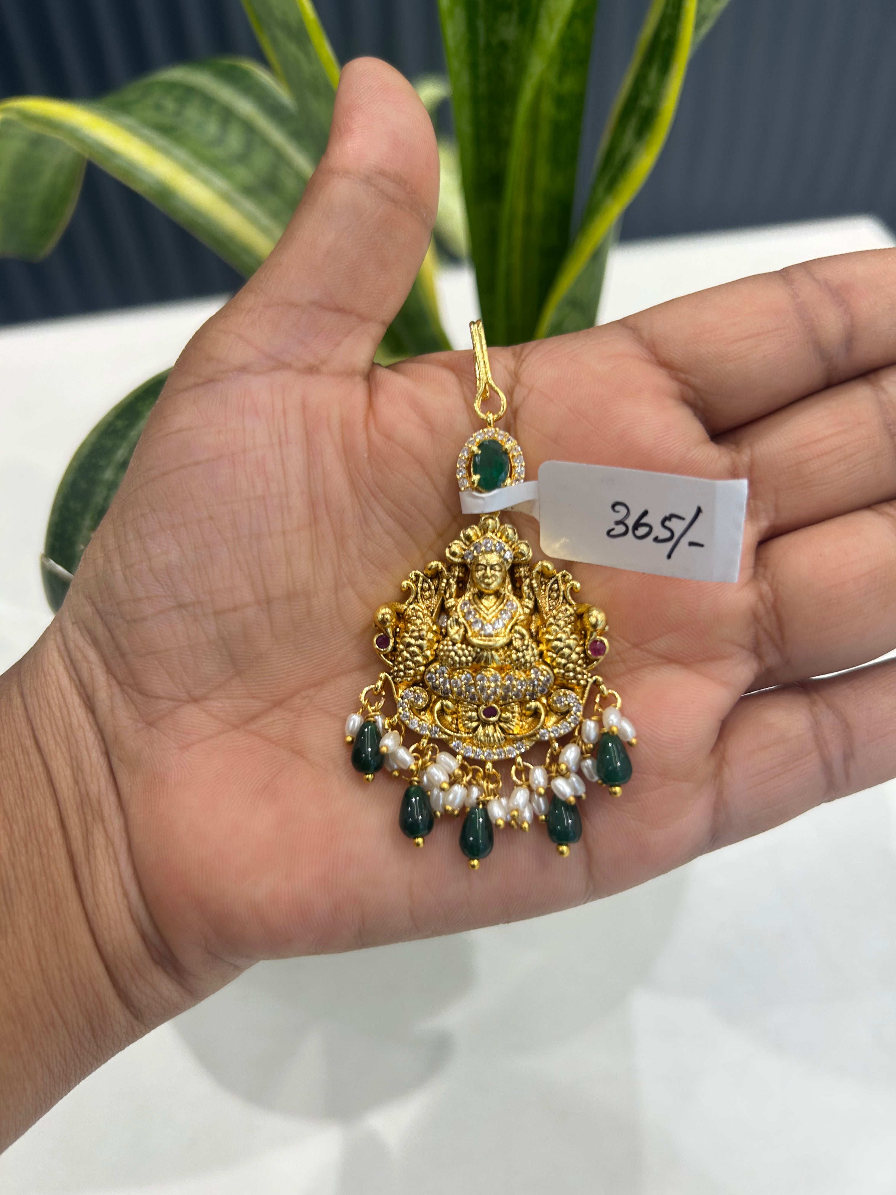 Beautiful Lakshmi devi tikka with green beads