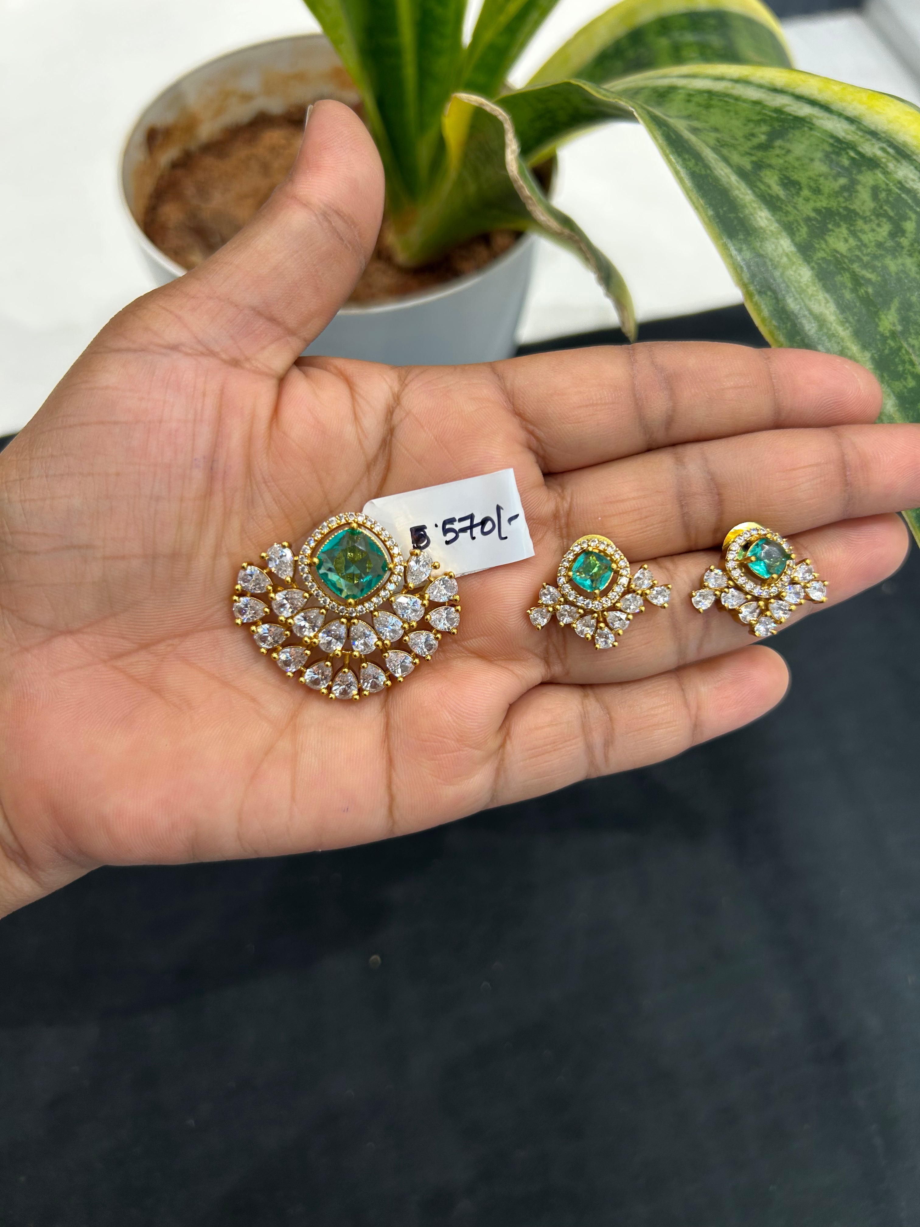 Beautiful green stone pendant set with backhook