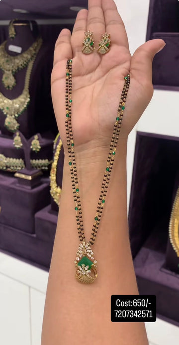 Beautiful green stone pendant set with blackbeads chain 18 inchs long