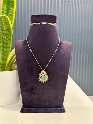 Beautiful green stone pendant with simple chain 18 inchs long