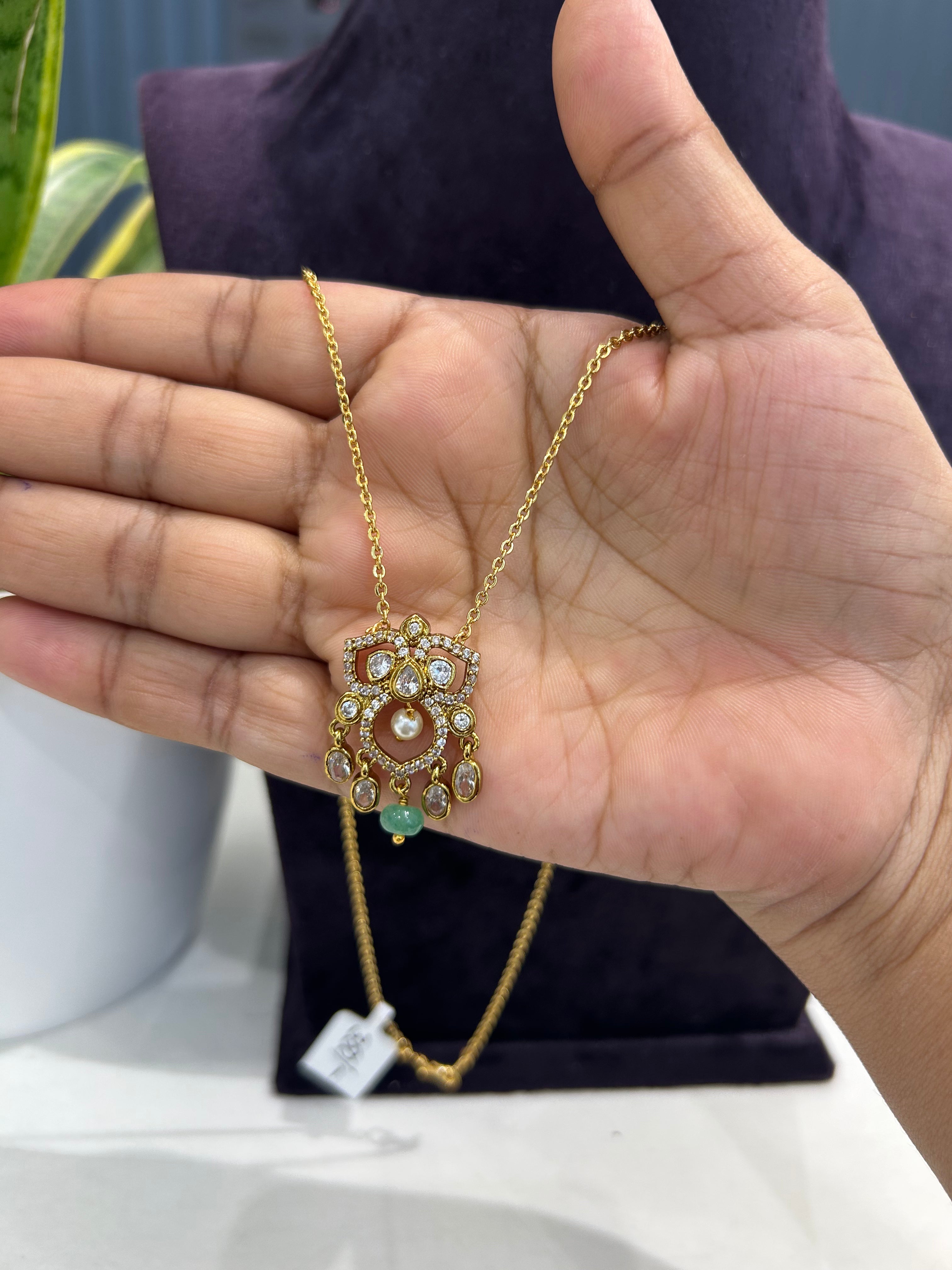 Beautiful white stones pendent with chandraharam chain 18 inchs long
