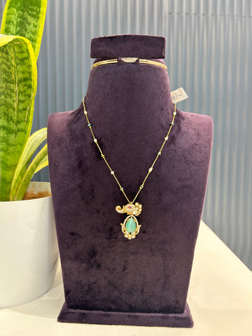 Beautiful green stone pendant with simple chain 18 inchs long