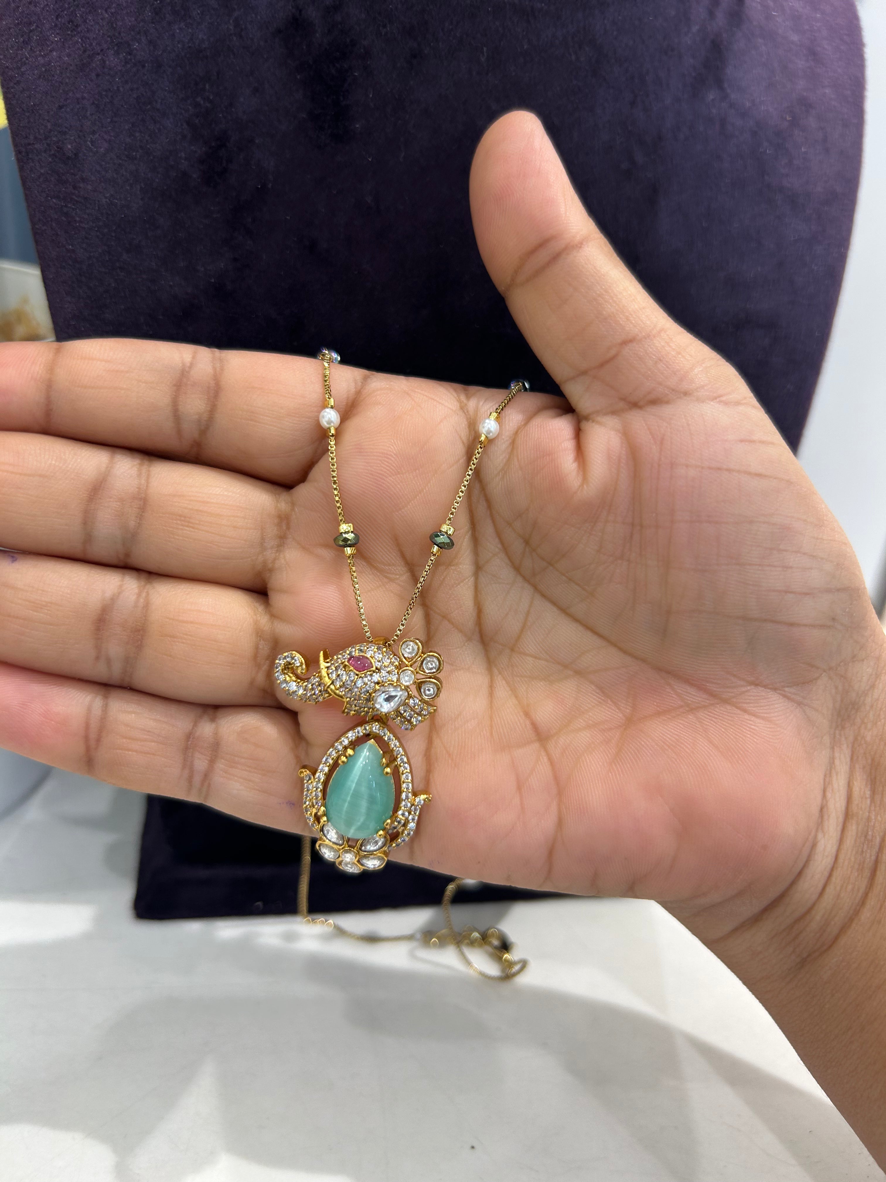 Beautiful green stone pendant with simple chain 18 inchs long