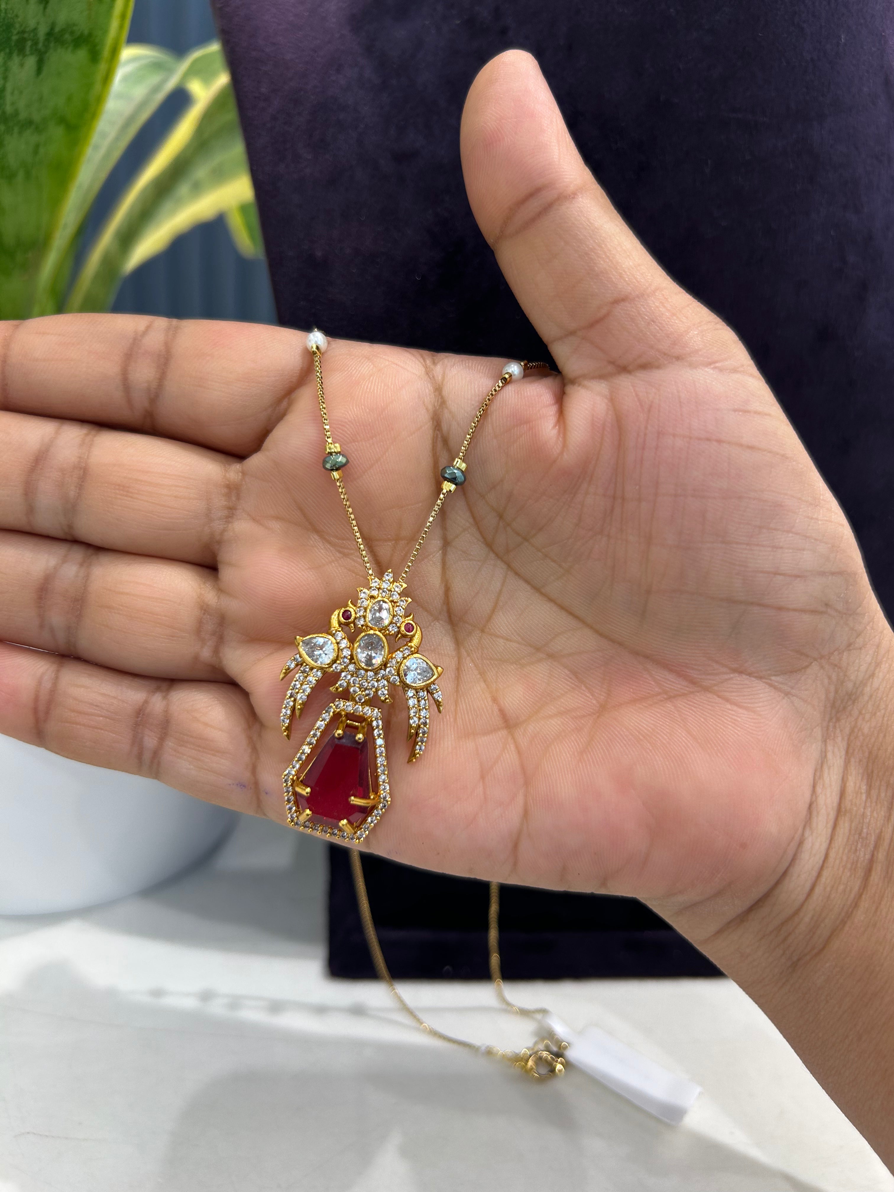 Beautiful red colour peacock design pedant with chain 18 inchs long