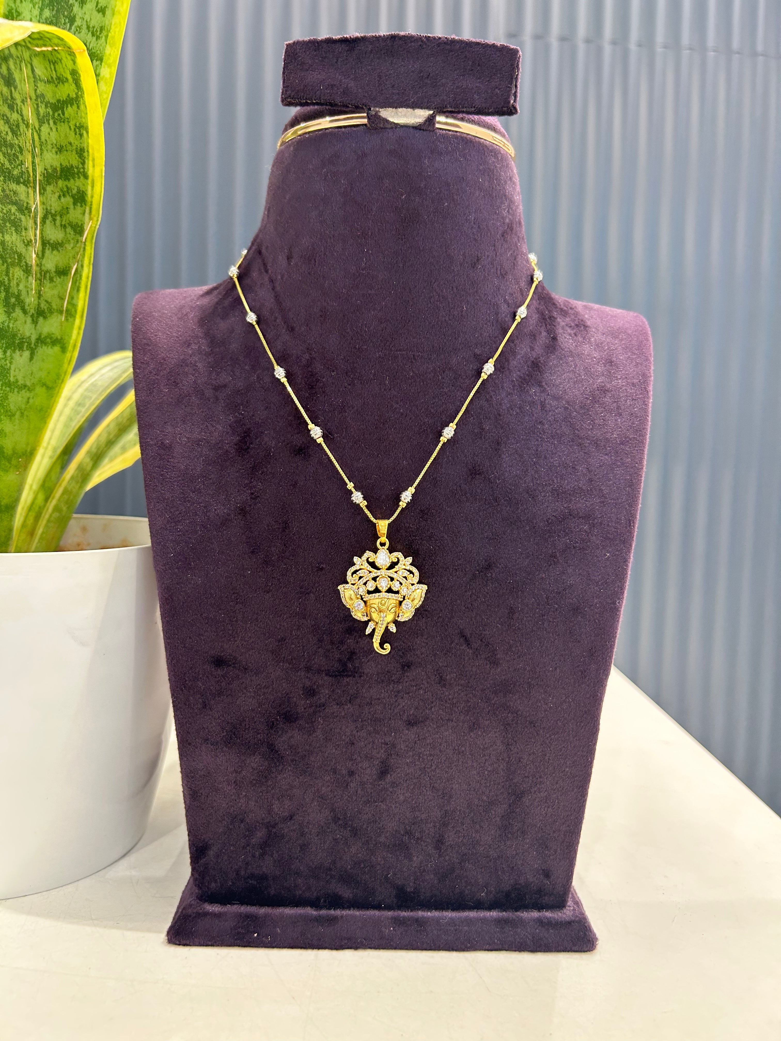 Beautiful CZ stone ganesh pendant with silver balls chain 18 inchs long