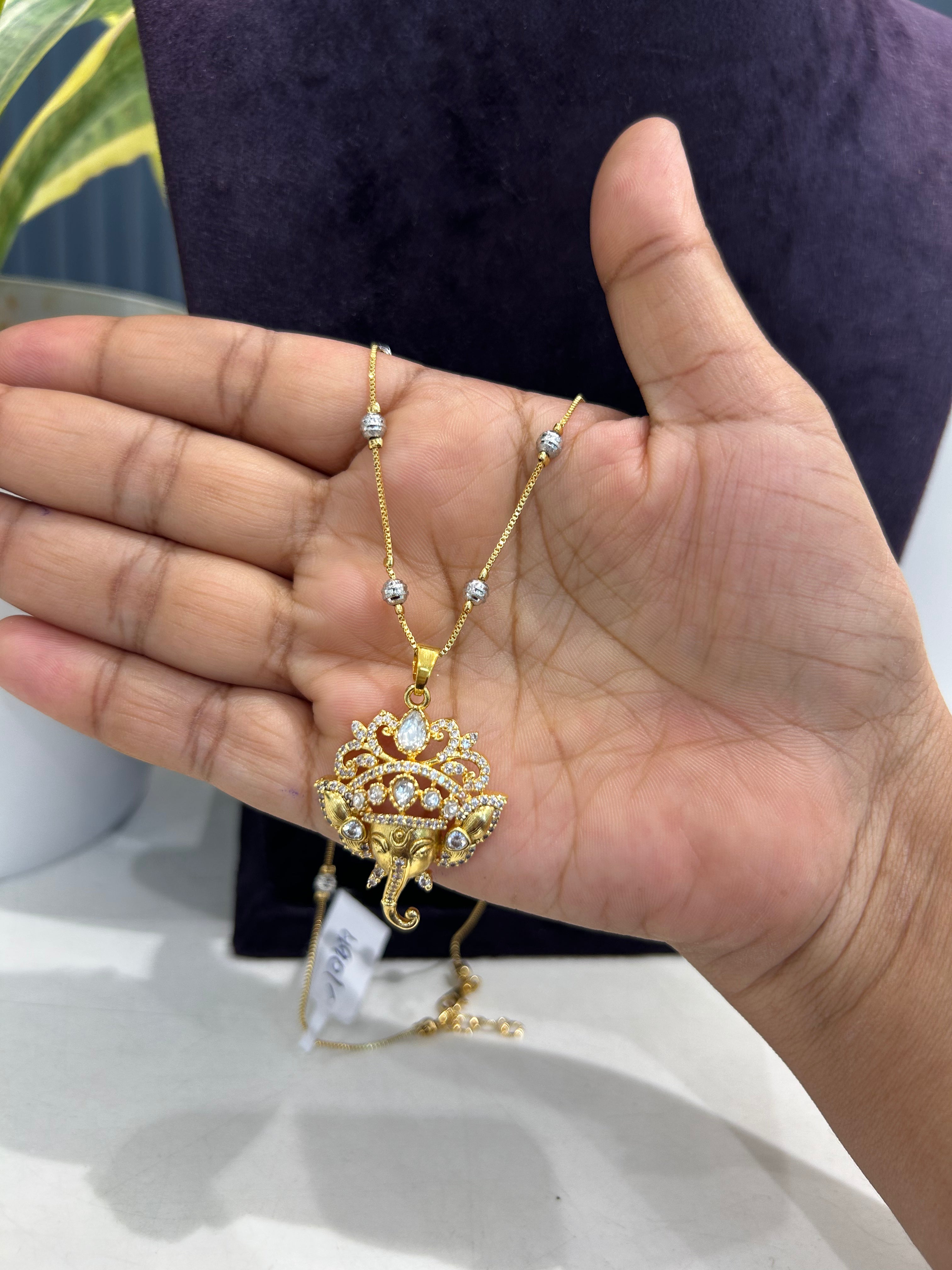 Beautiful CZ stone ganesh pendant with silver balls chain 18 inchs long