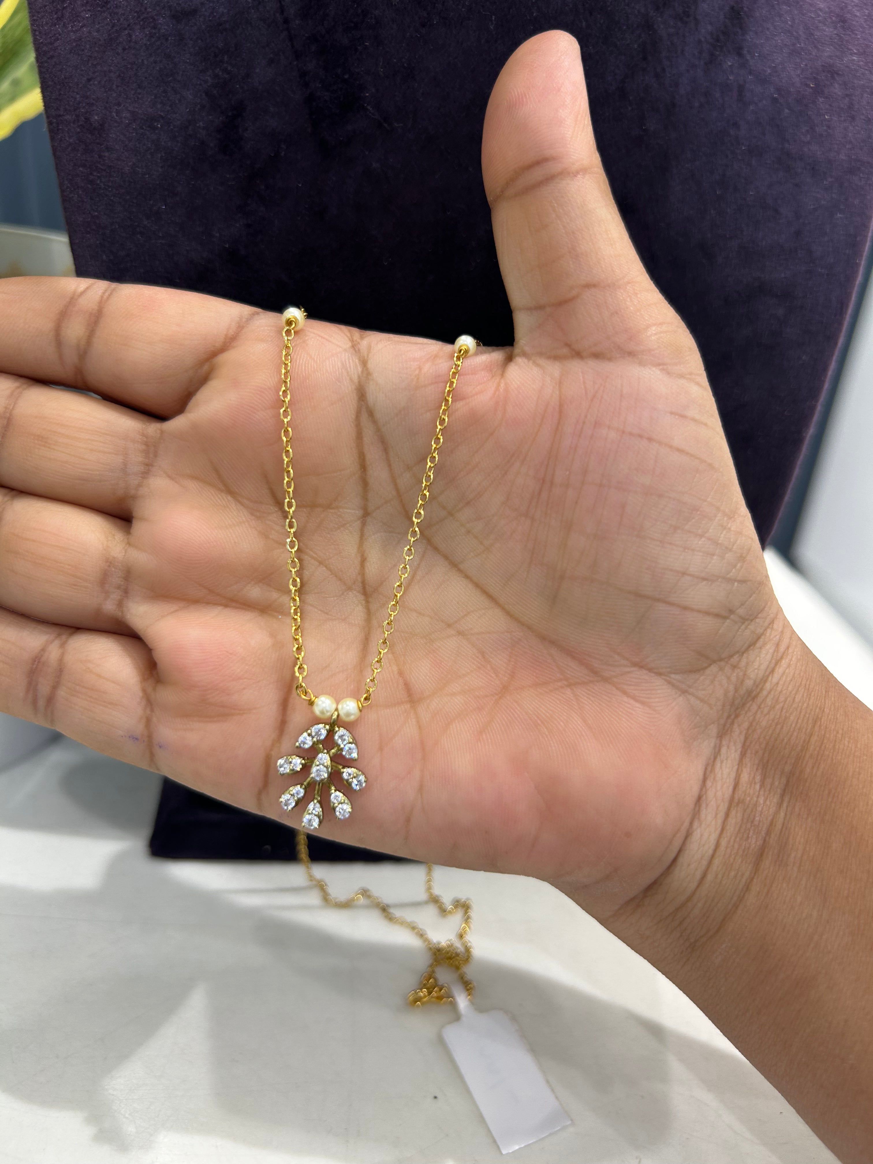 Beautiful white stone locket with chandraharam chain 18 inchs long