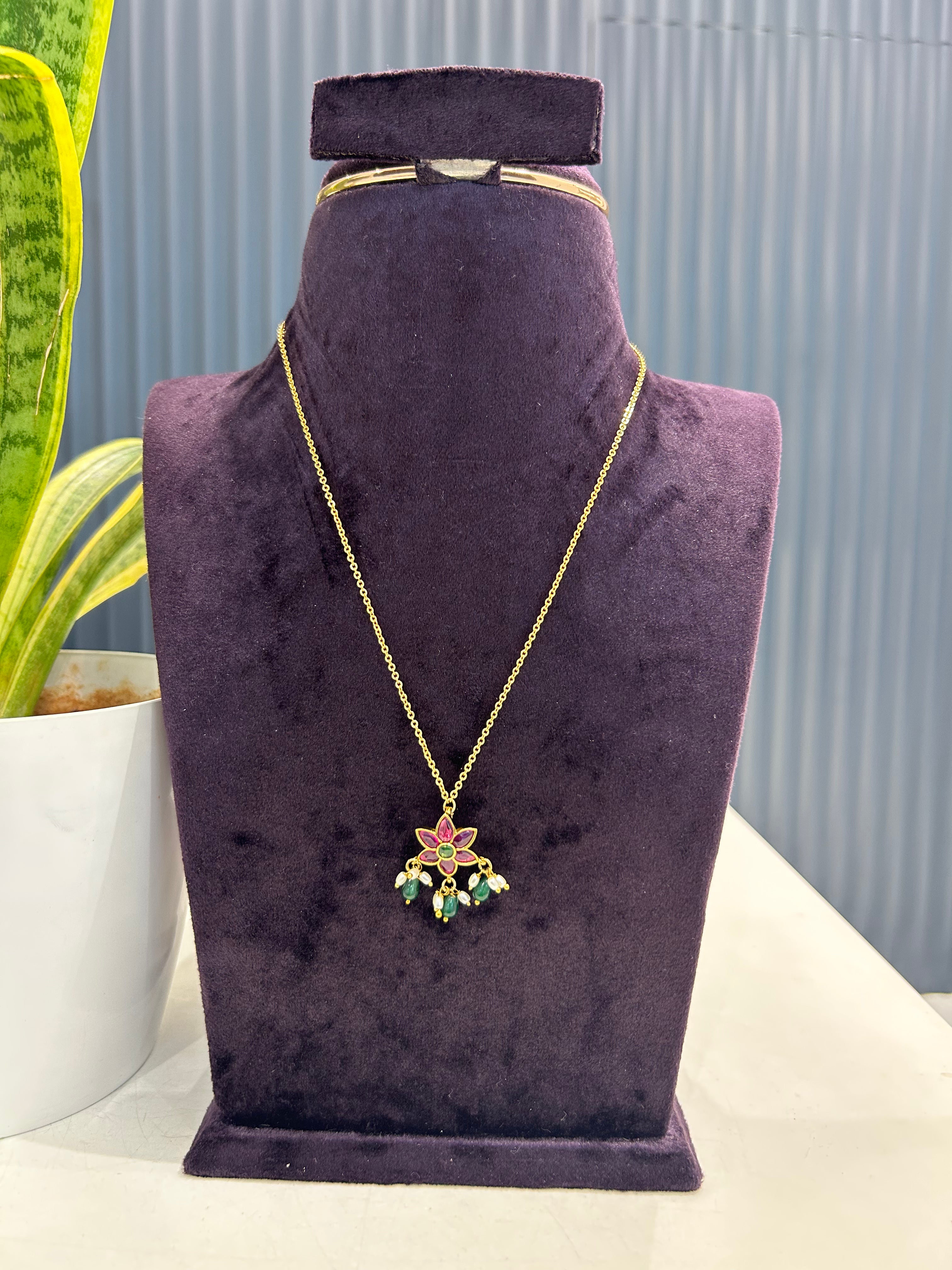 Beautiful simple flower locket with chandraharam chain 18 inchs long