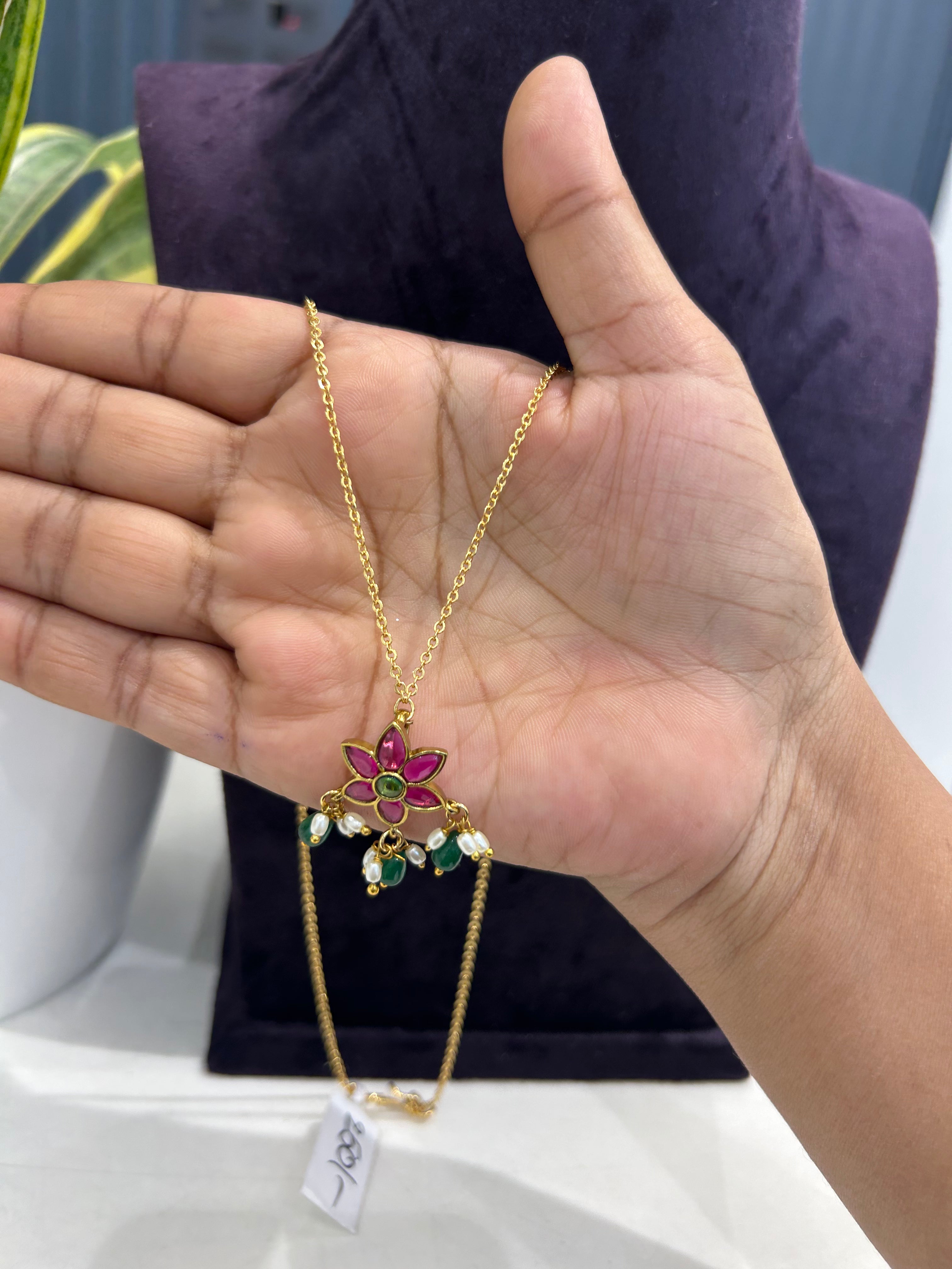 Beautiful simple flower locket with chandraharam chain 18 inchs long