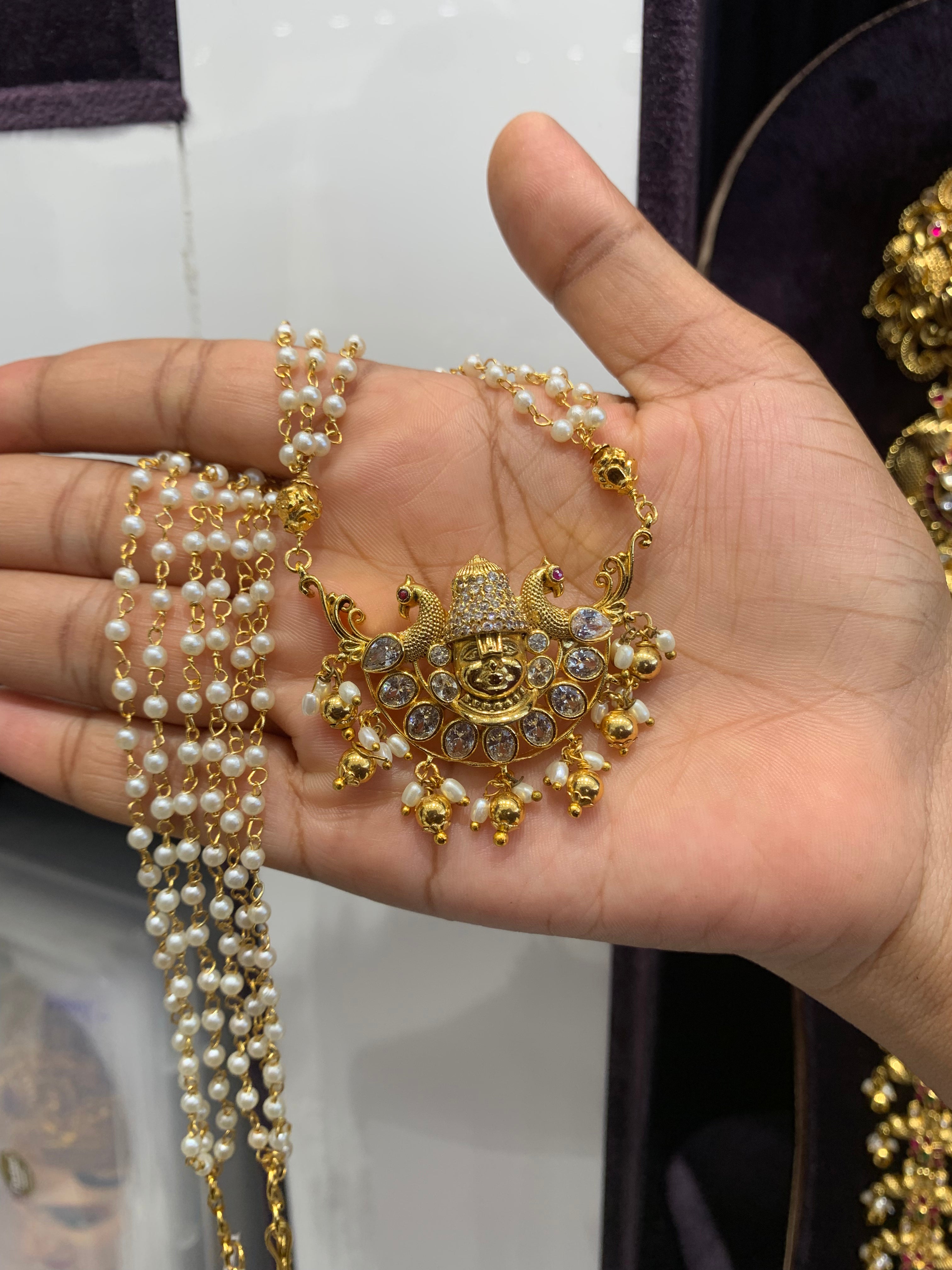 Beautiful balaji pendant with pearls chain 18 inchs long