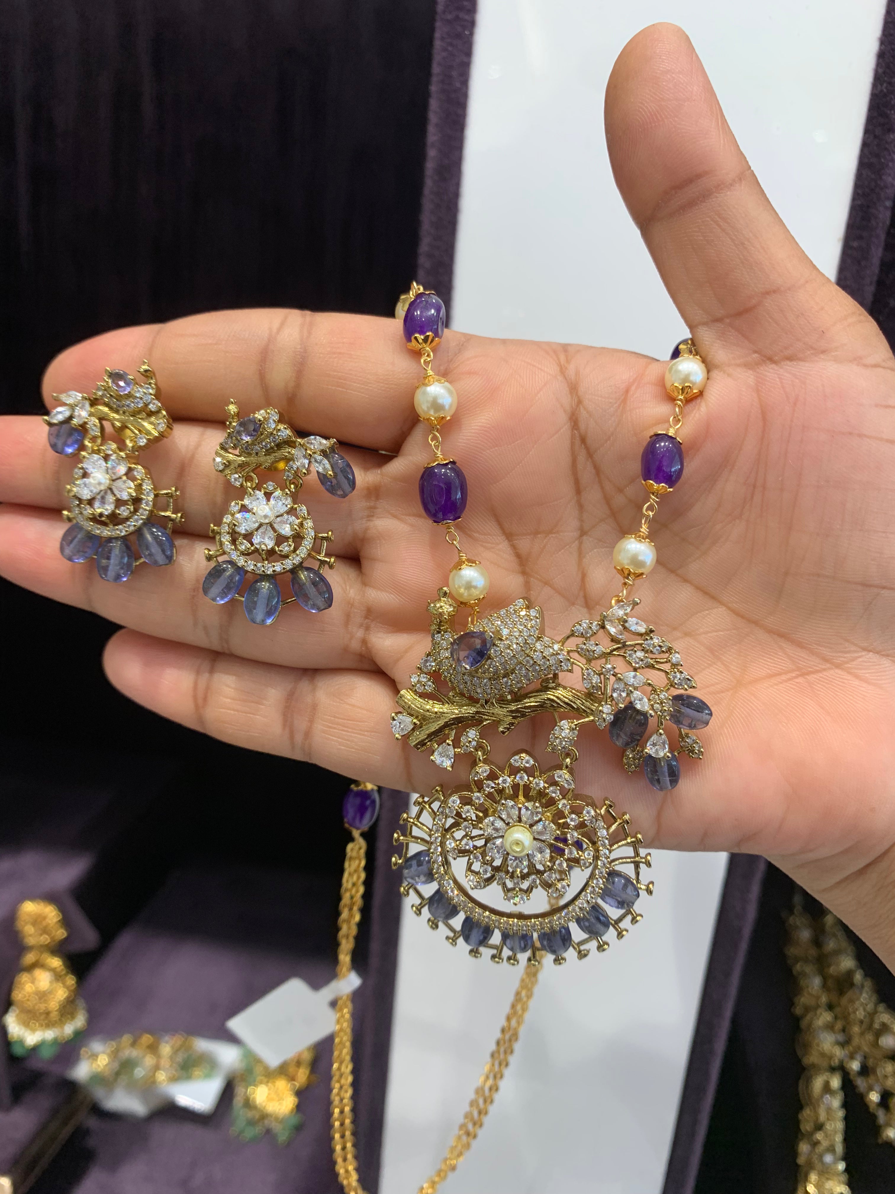 Beautiful purple color peacock design pendant with beads mala 18 to 20 inchs