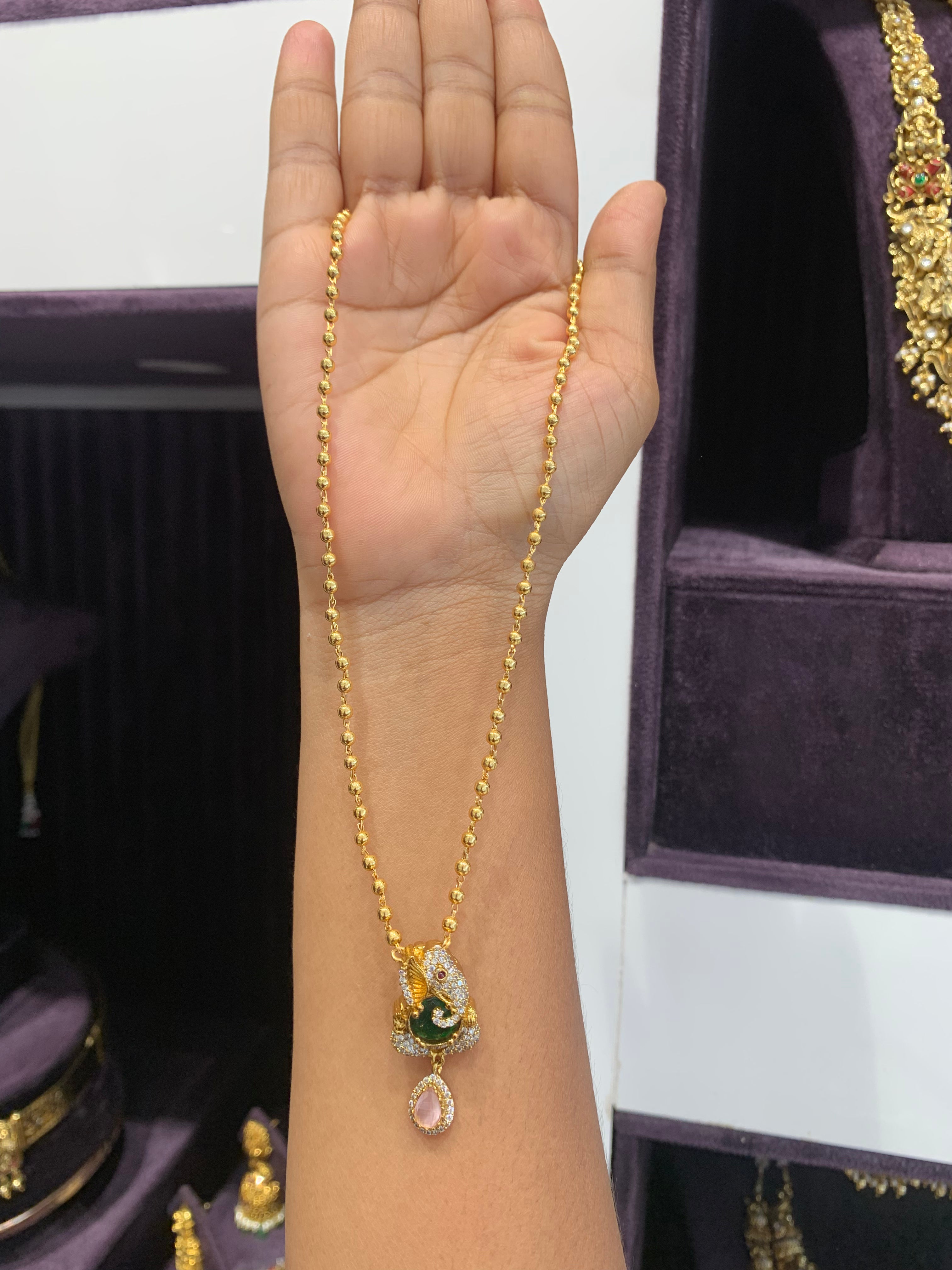 Beautiful ganesh pendant gold balls chain 18 inchs long