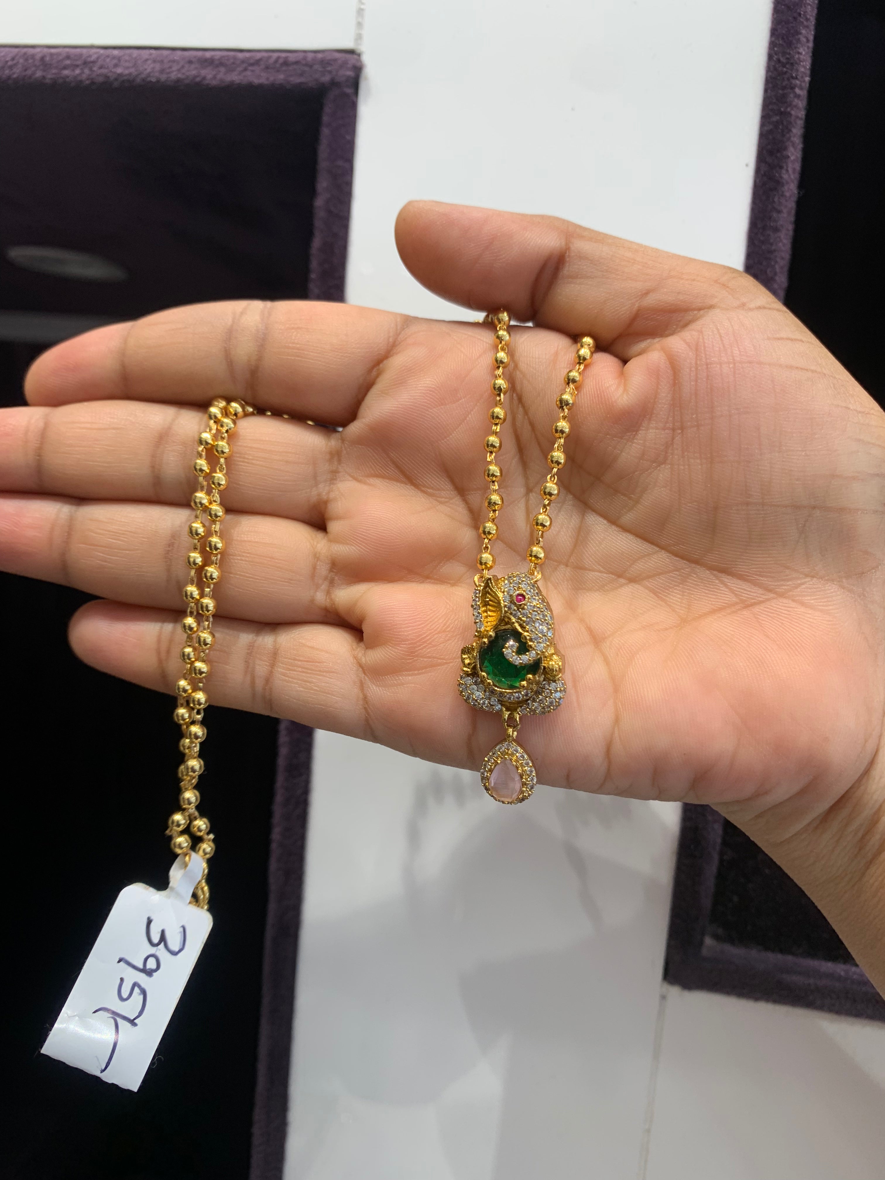 Beautiful ganesh pendant gold balls chain 18 inchs long