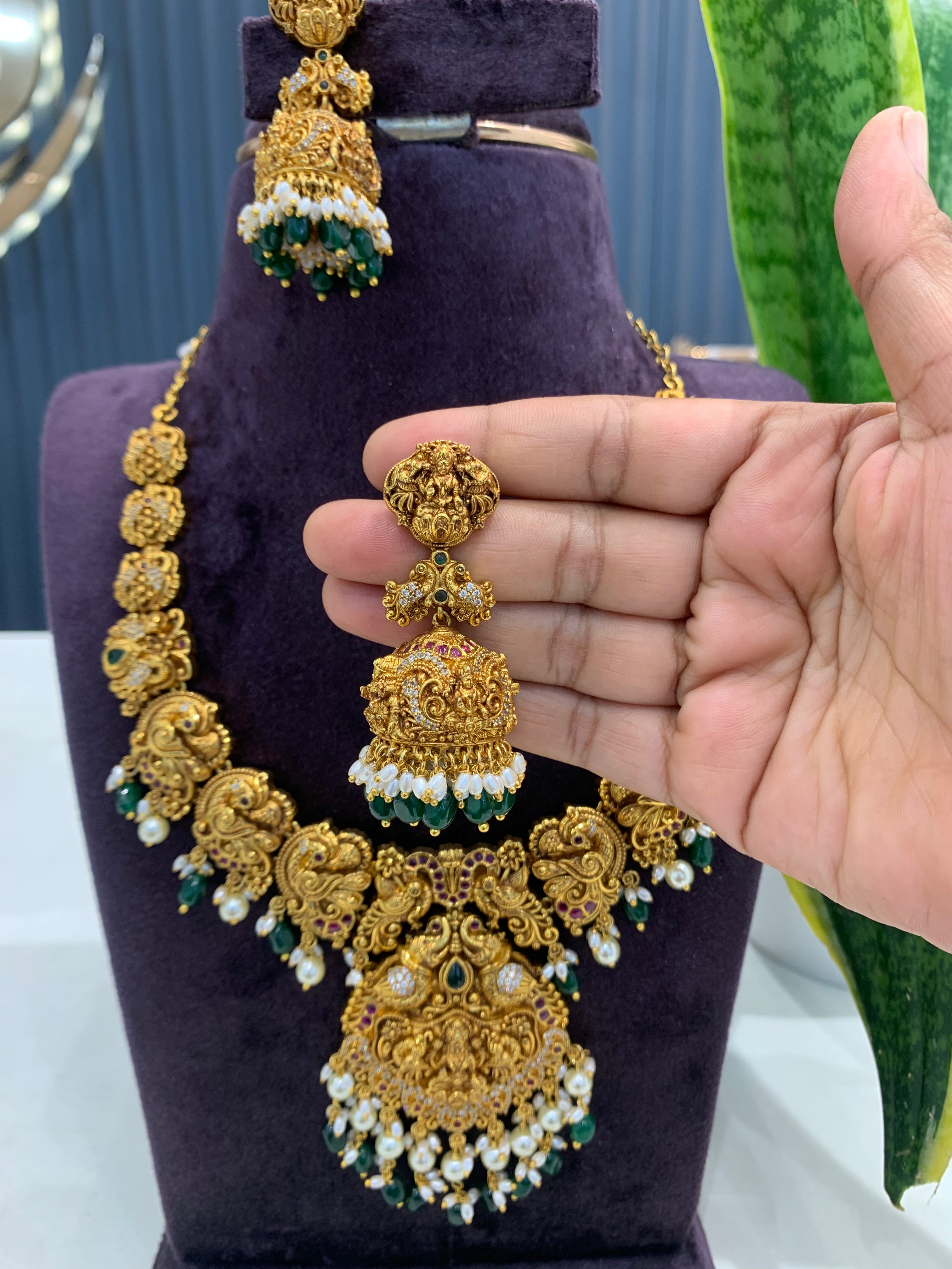 Beautiful pota stone Lakshmi devi model necklace with with screwback jumkis