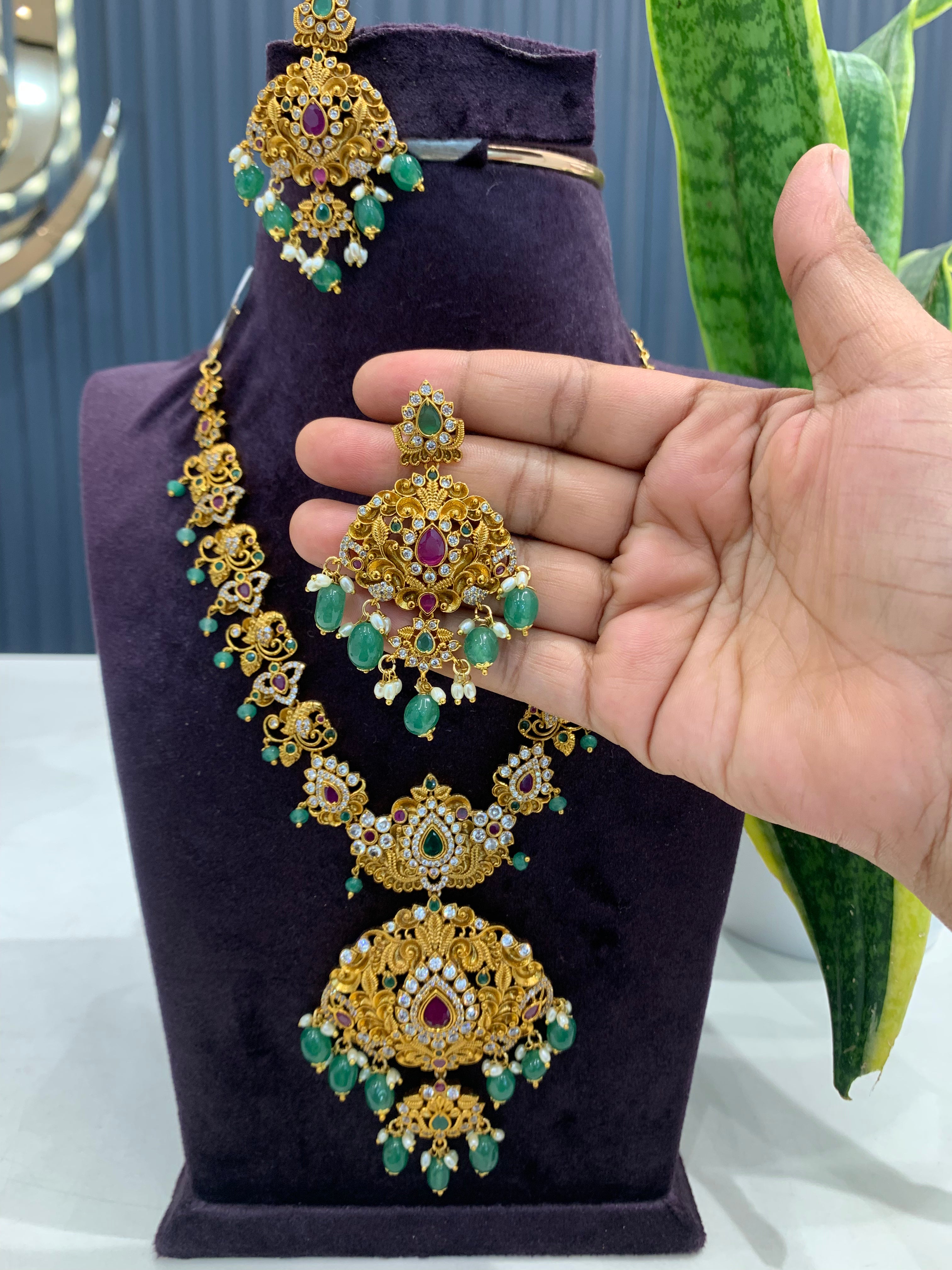 Beautiful CZ stones peacock design necklace with screwback ear hangings