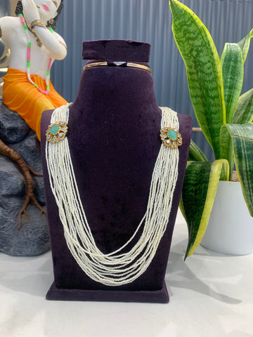 Beautiful carving stone side pendants with white beads mala