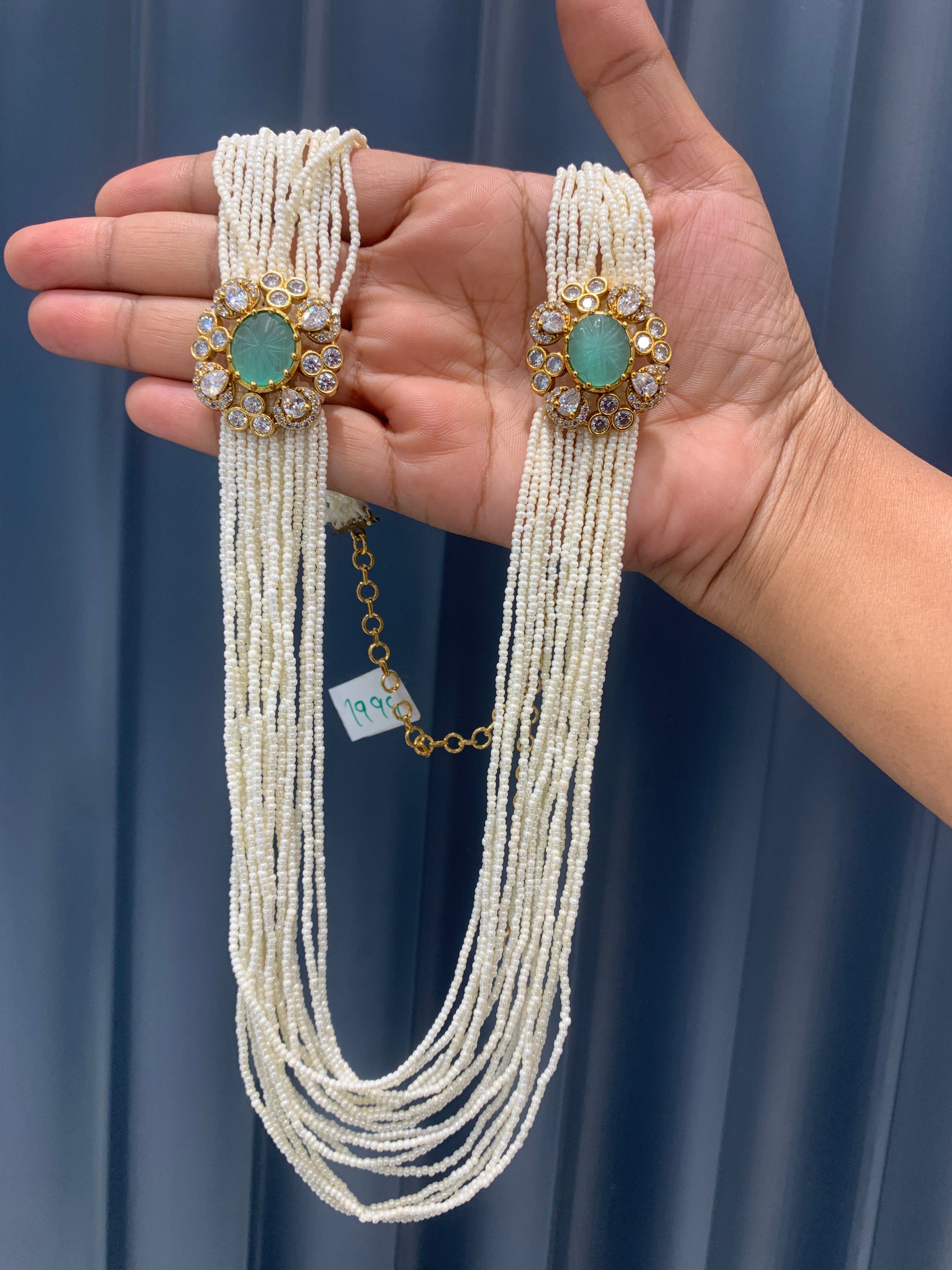 Beautiful carving stone side pendants with white beads mala