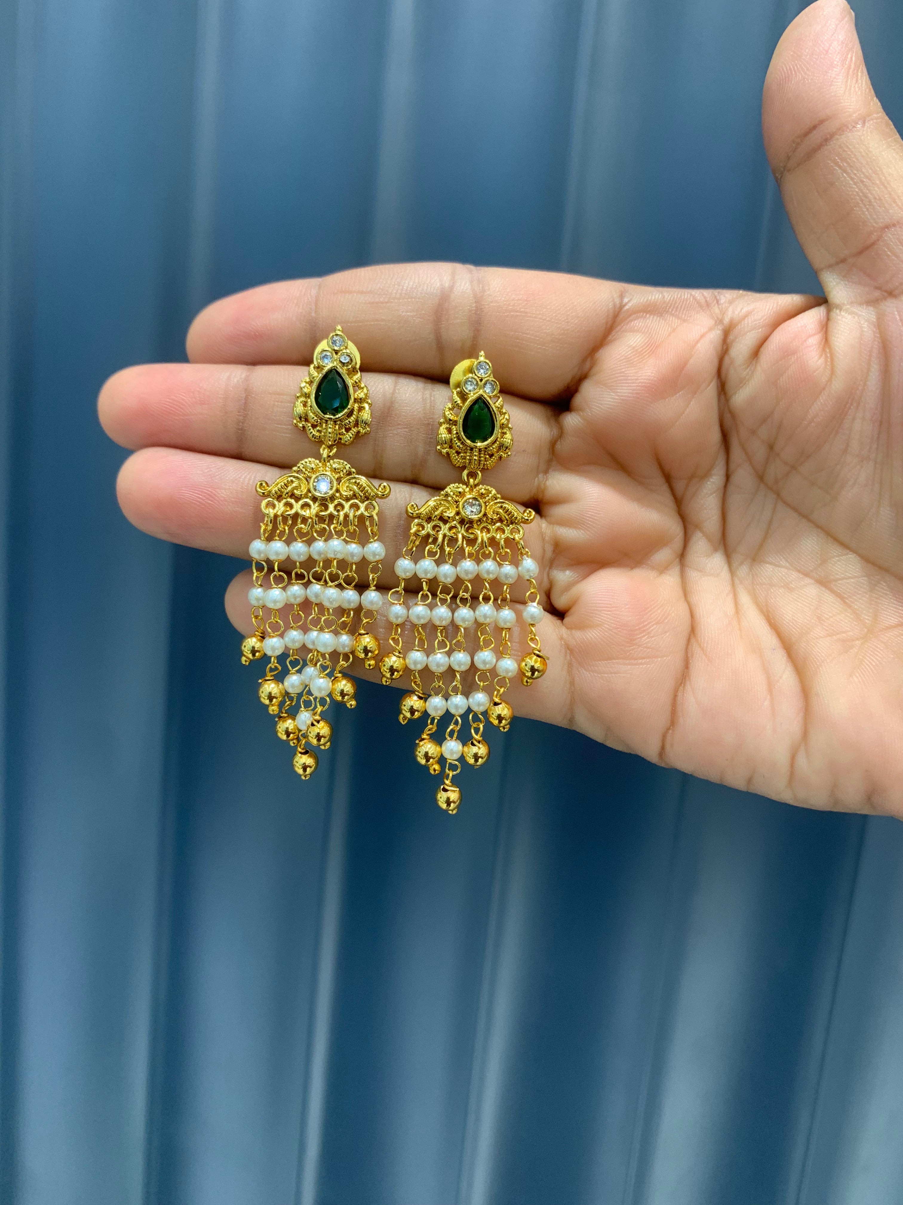 Beautiful green stone ear hangings with pearls chain
