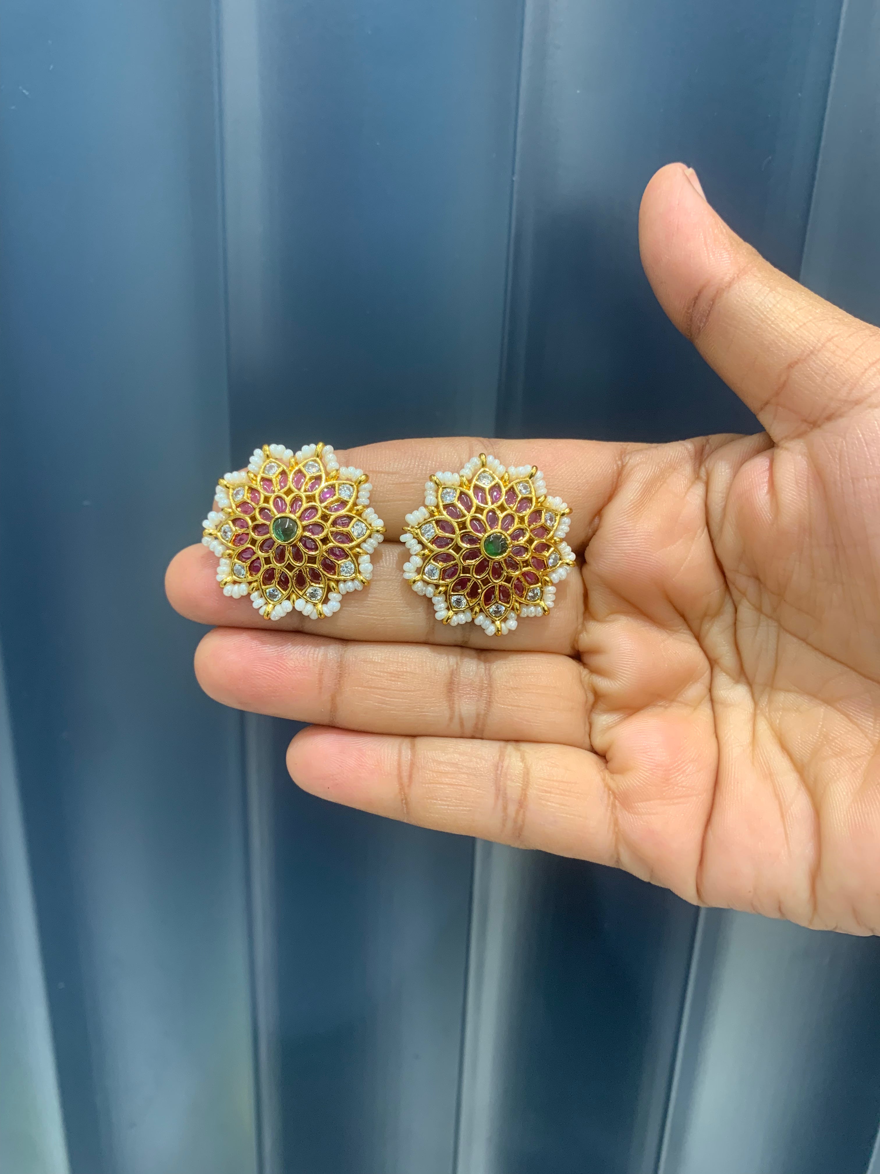 Beautiful pota stone pushback studs with pearls finishing