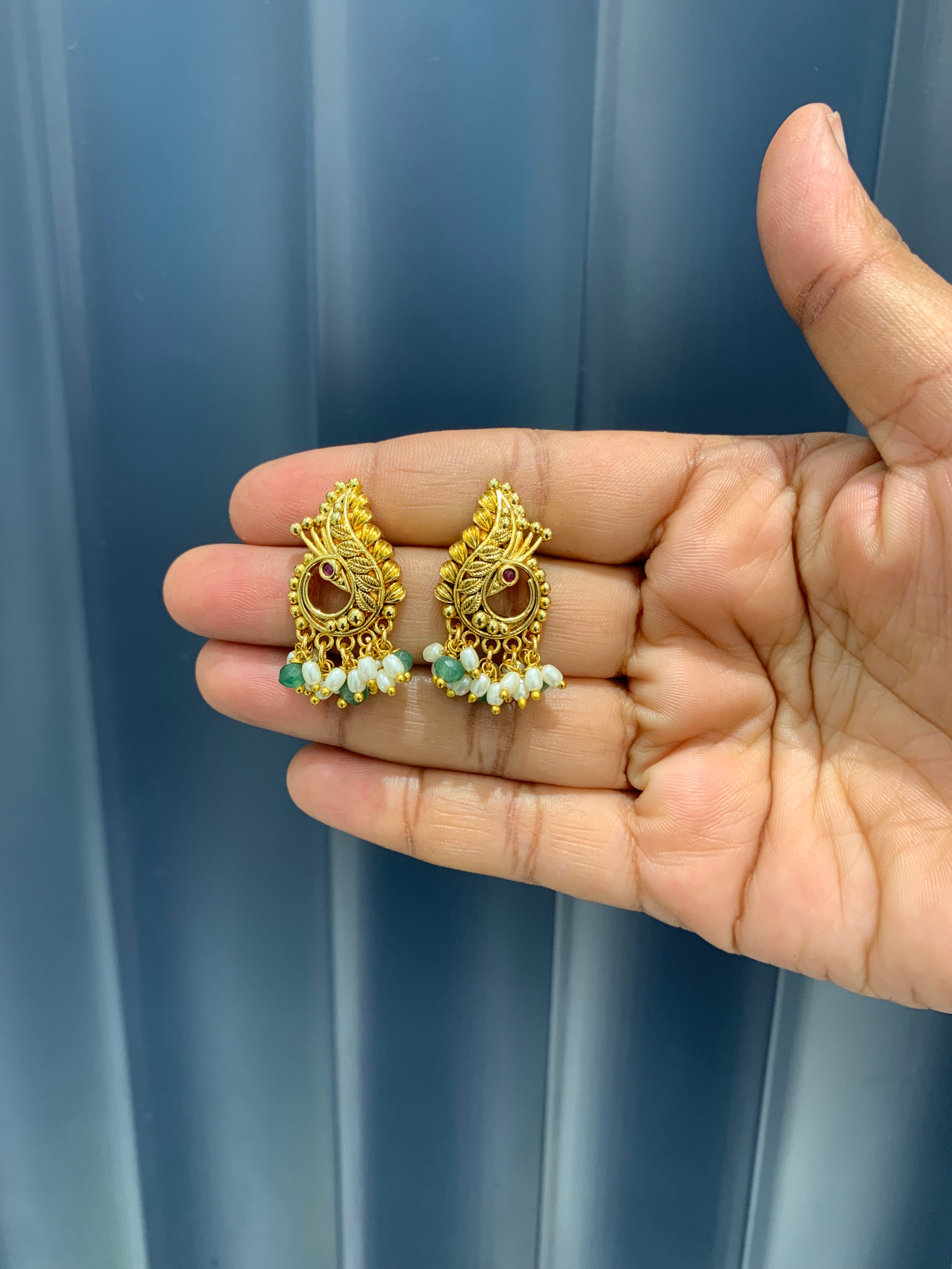 Beautiful peacock design studs with pushback