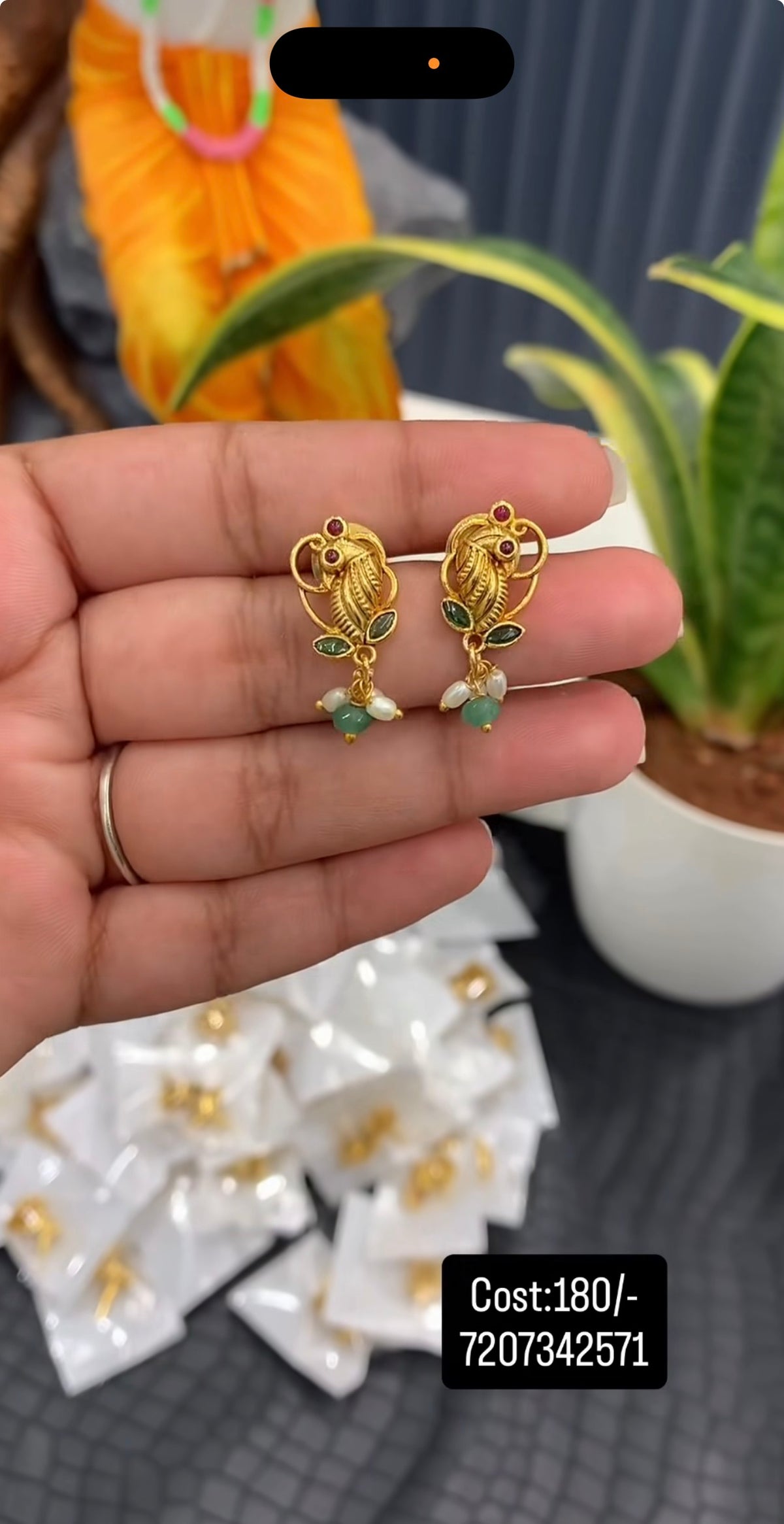 Beautiful peacock design studs with pushback
