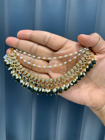 Beautiful CZ stone’s champaswaralu with green beads
