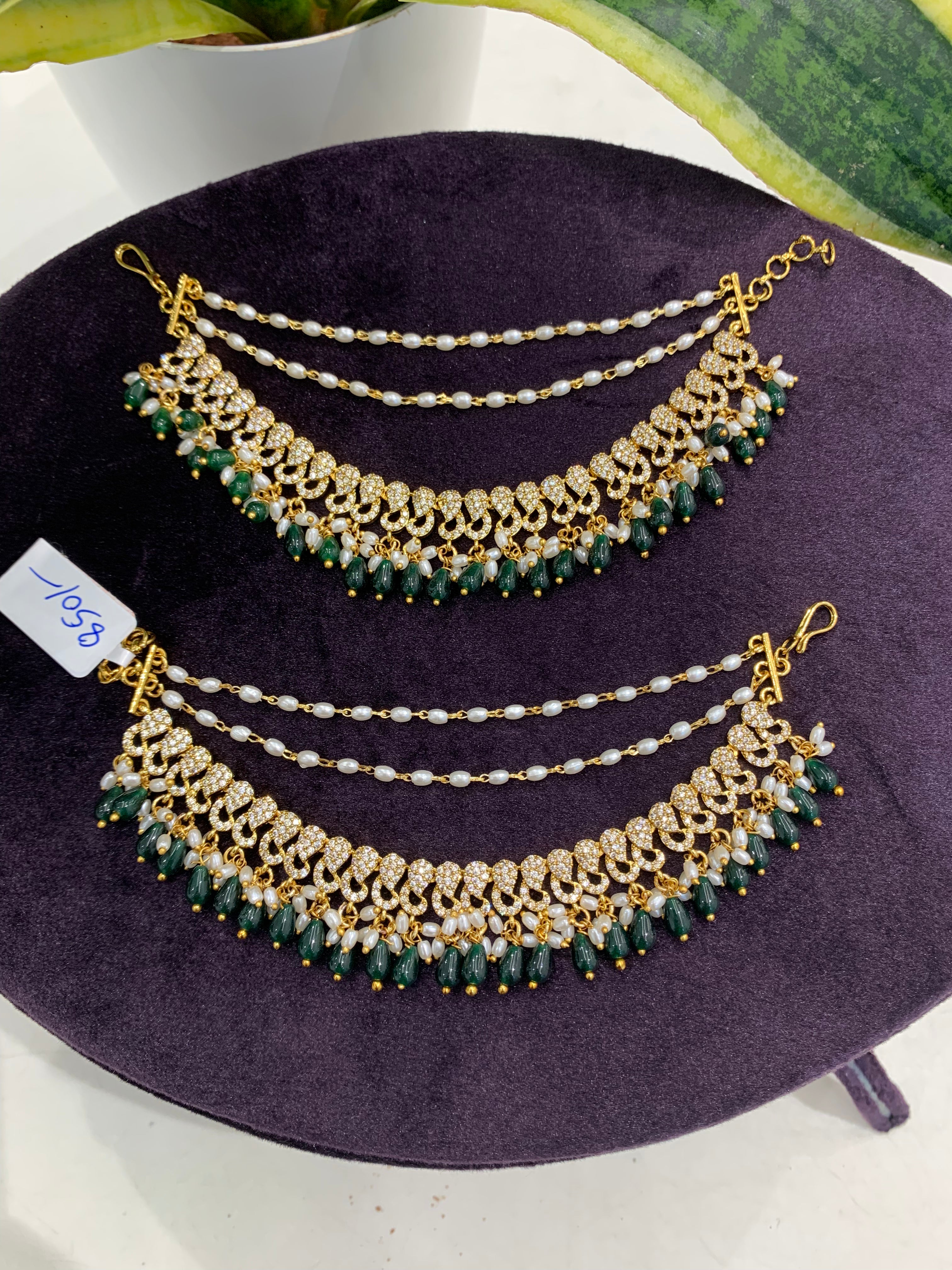 Beautiful CZ stone’s champaswaralu with green beads